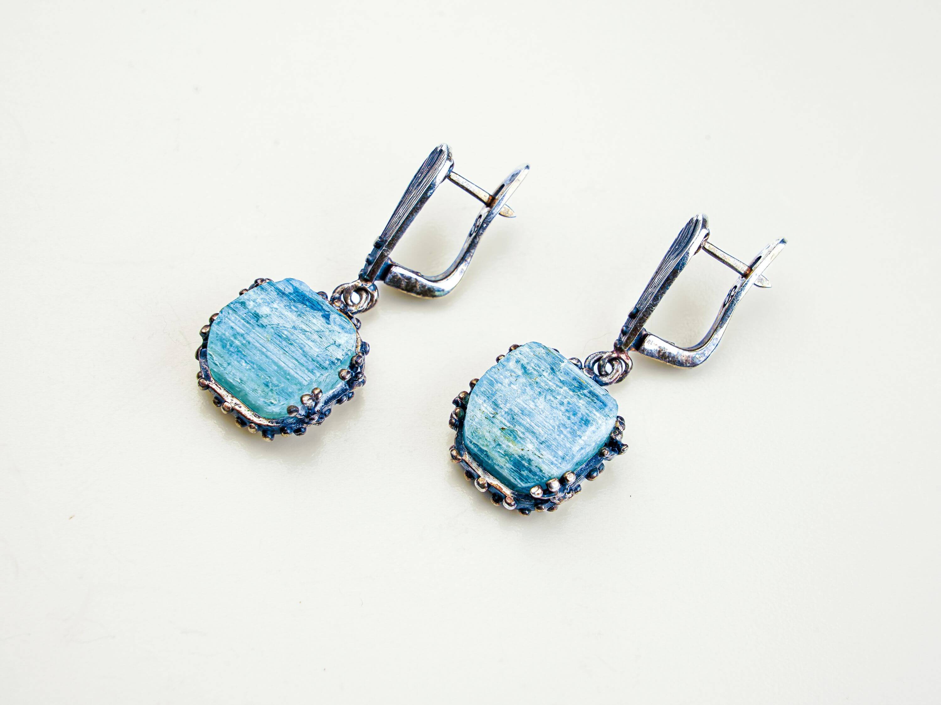 Aquamarine earrings raw aqua crystal silver drop earrings clean hero image