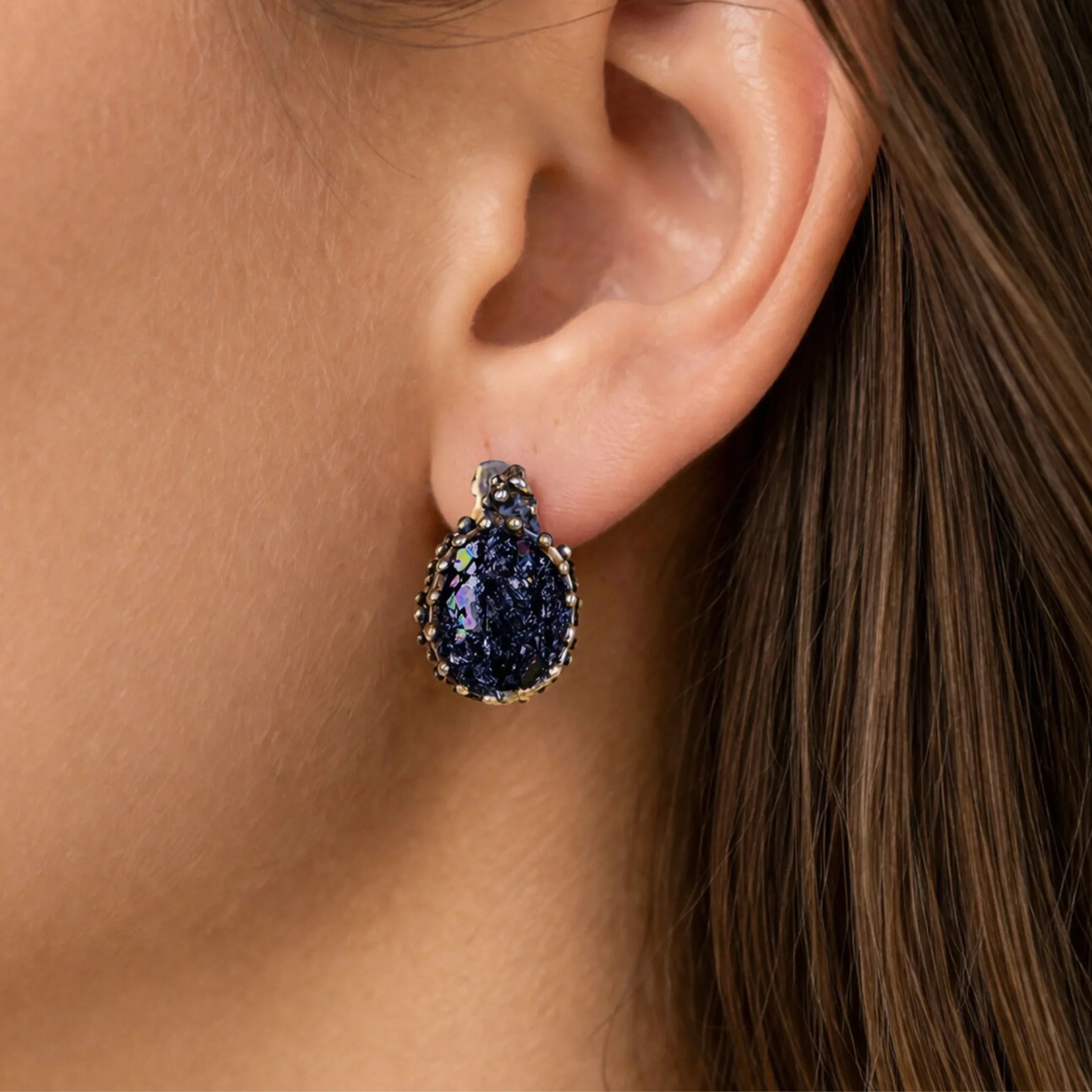 Black moissanite earrings worn on ear leverback sterling silver dark gemstone