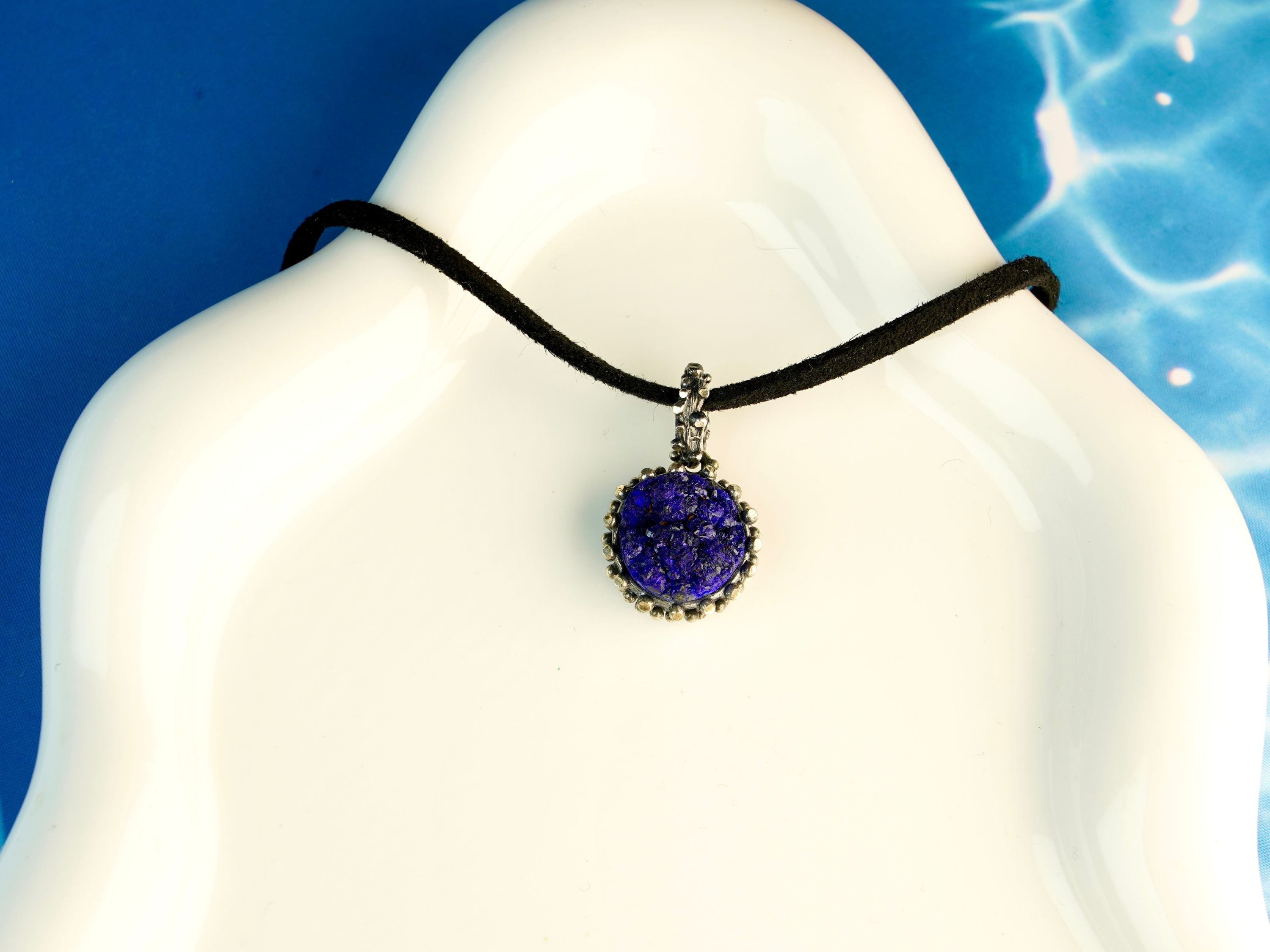 lapis lazuli necklace on display, elegant blue gemstone sterling silver pendant