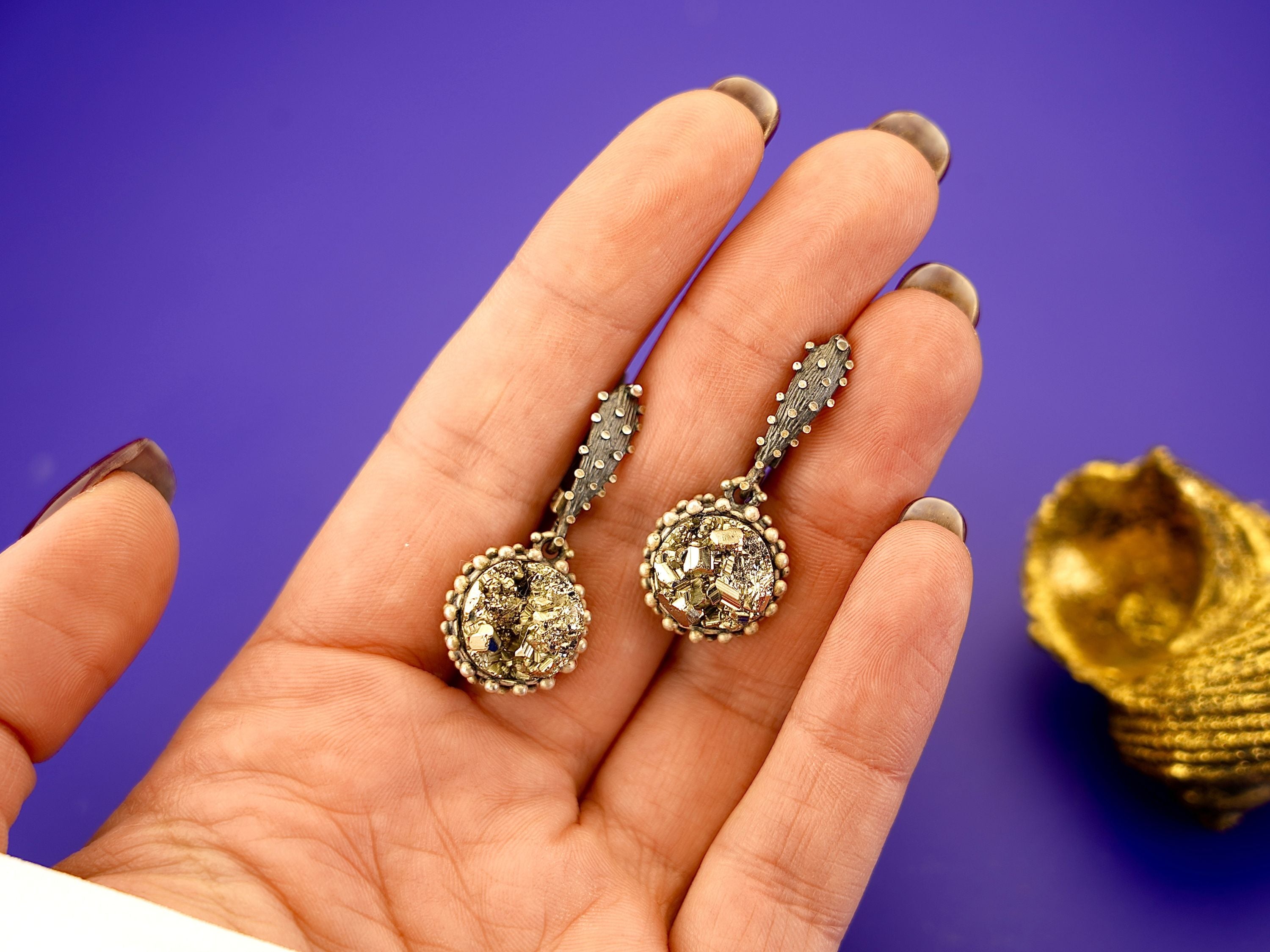 Pyrite earrings on hand size reference gold crystal stone silver earrings