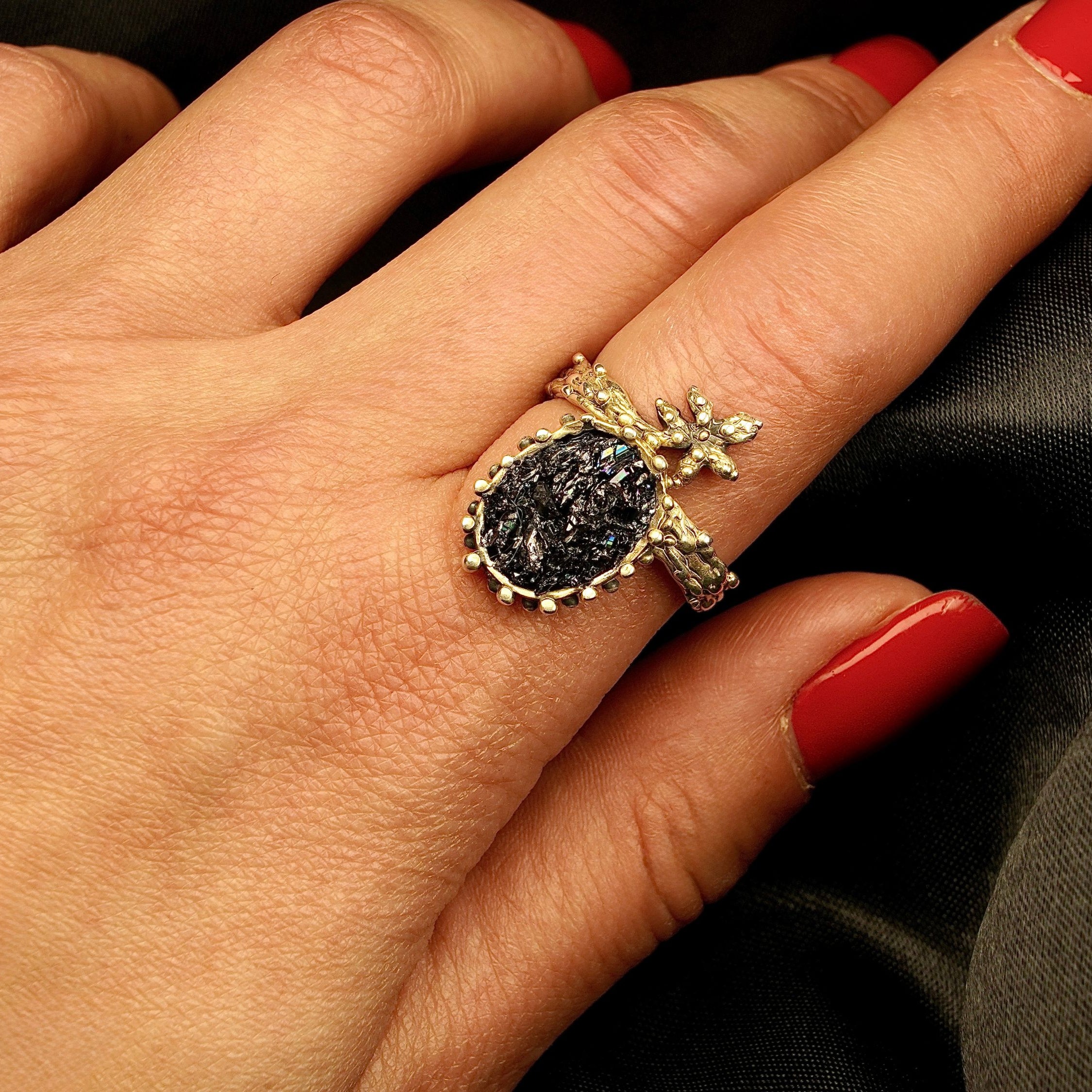 Black tourmaline statement ring on hand size reference ornate silver adjustable ring