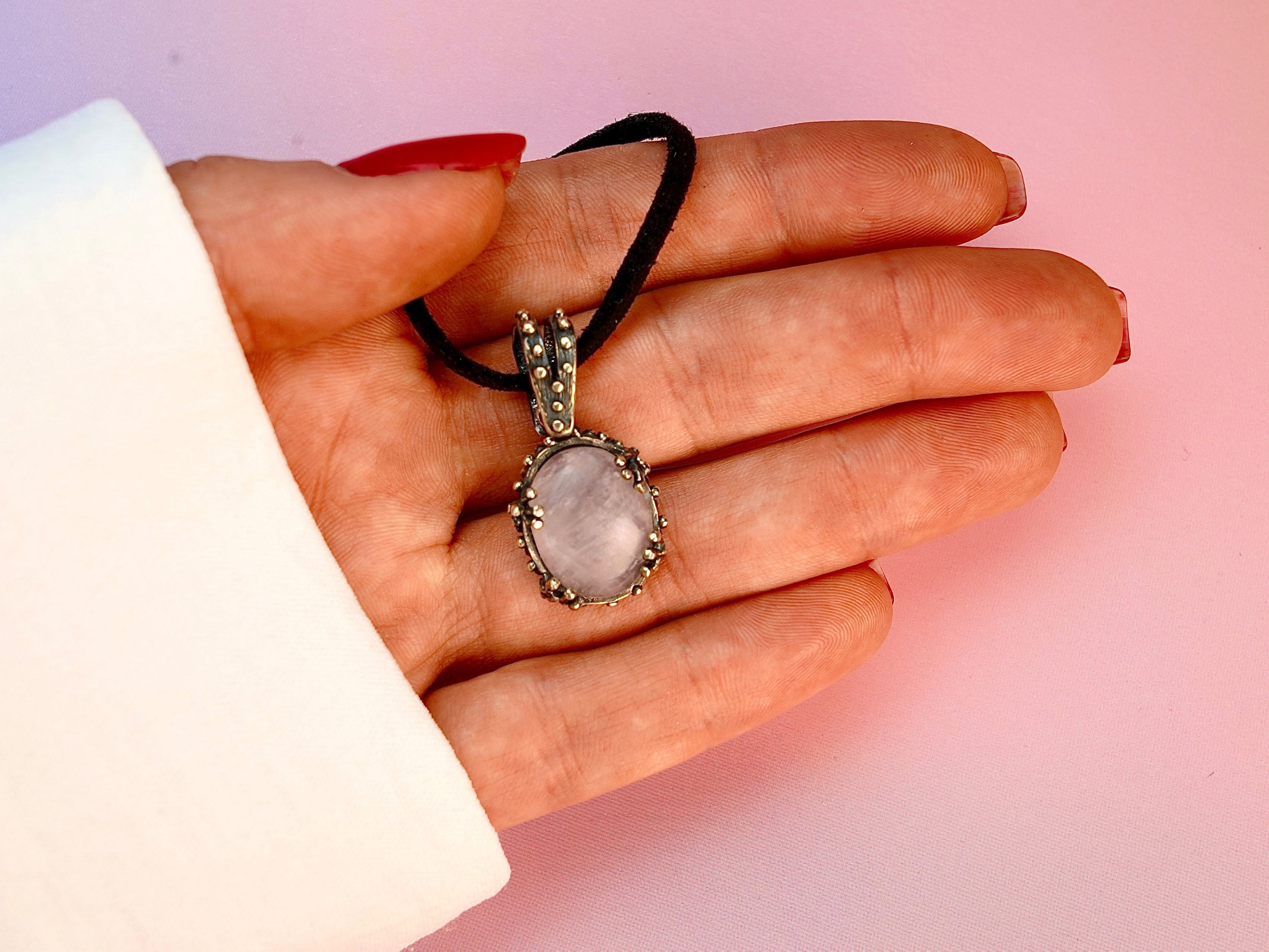 Rose quartz necklace on hand size reference pink gemstone silver pendant