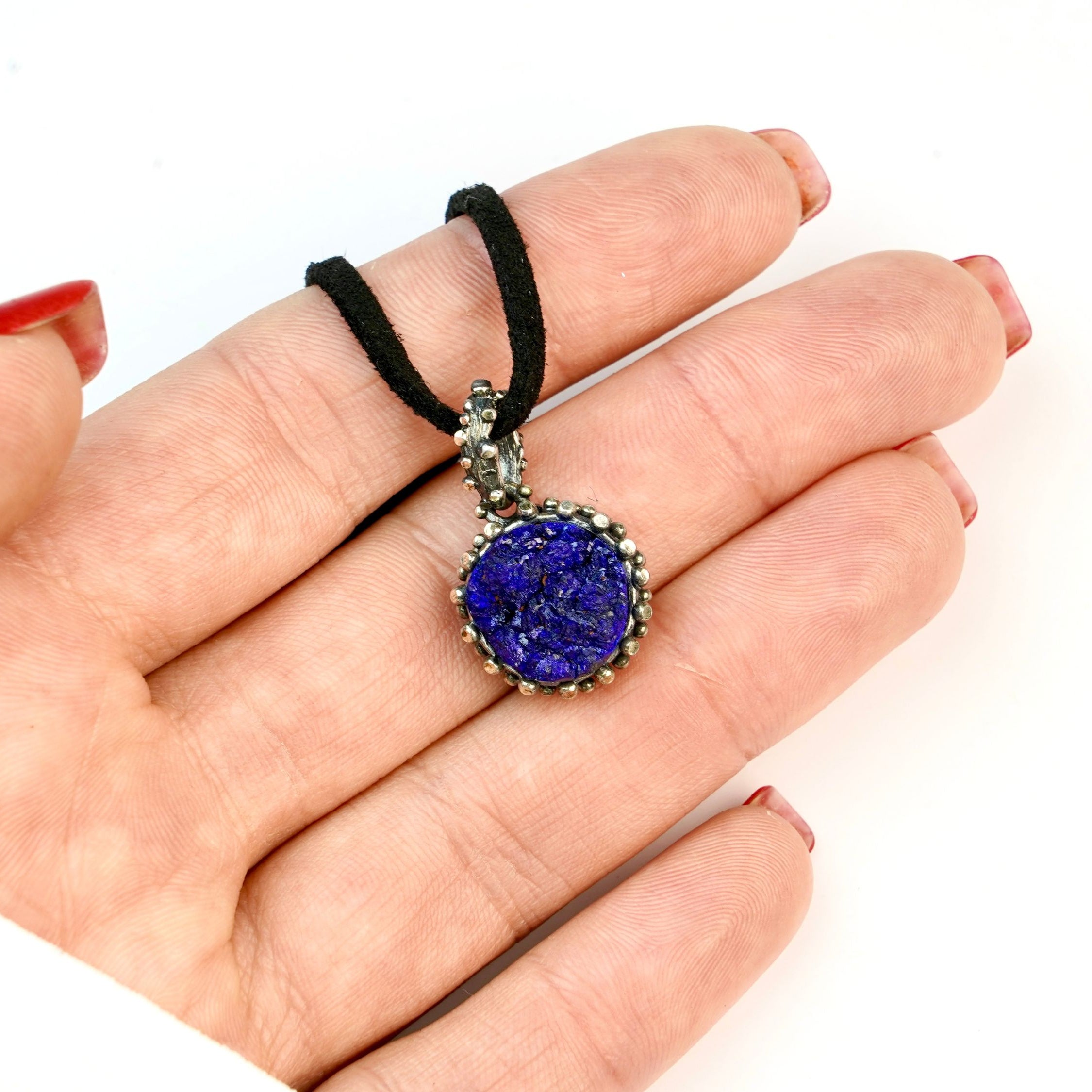 lapis lazuli necklace on hand, size reference elegant blue gemstone jewelry