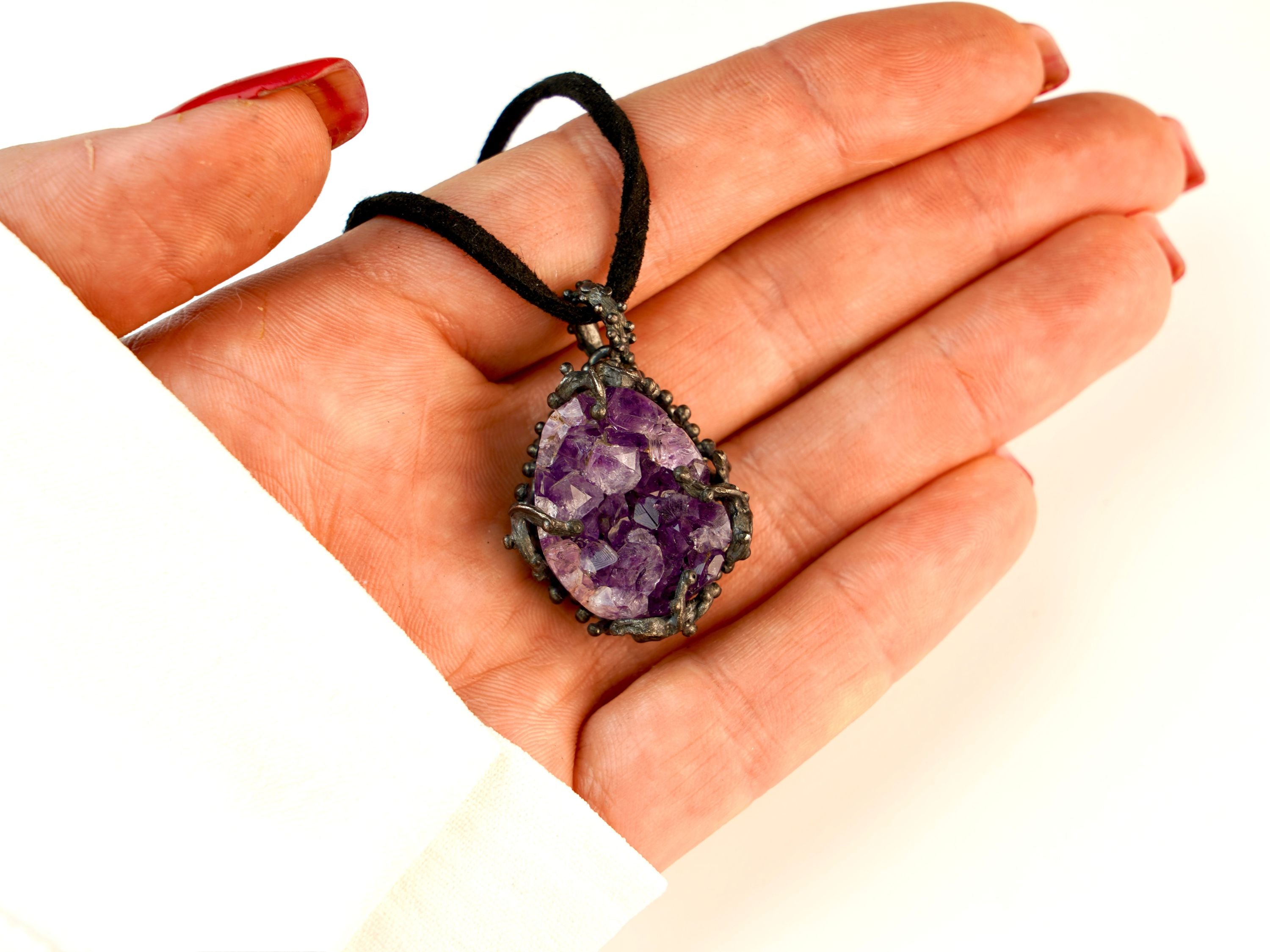 amethyst pendant necklace on hand, size reference raw crystal jewelry