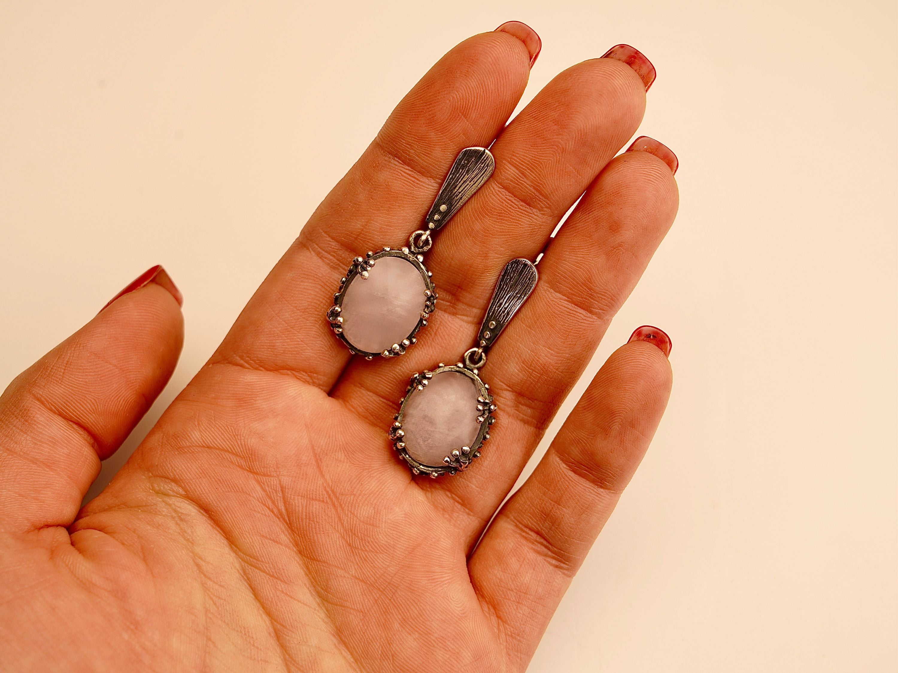rose quartz earrings on hand, size reference pink gemstone drop earrings