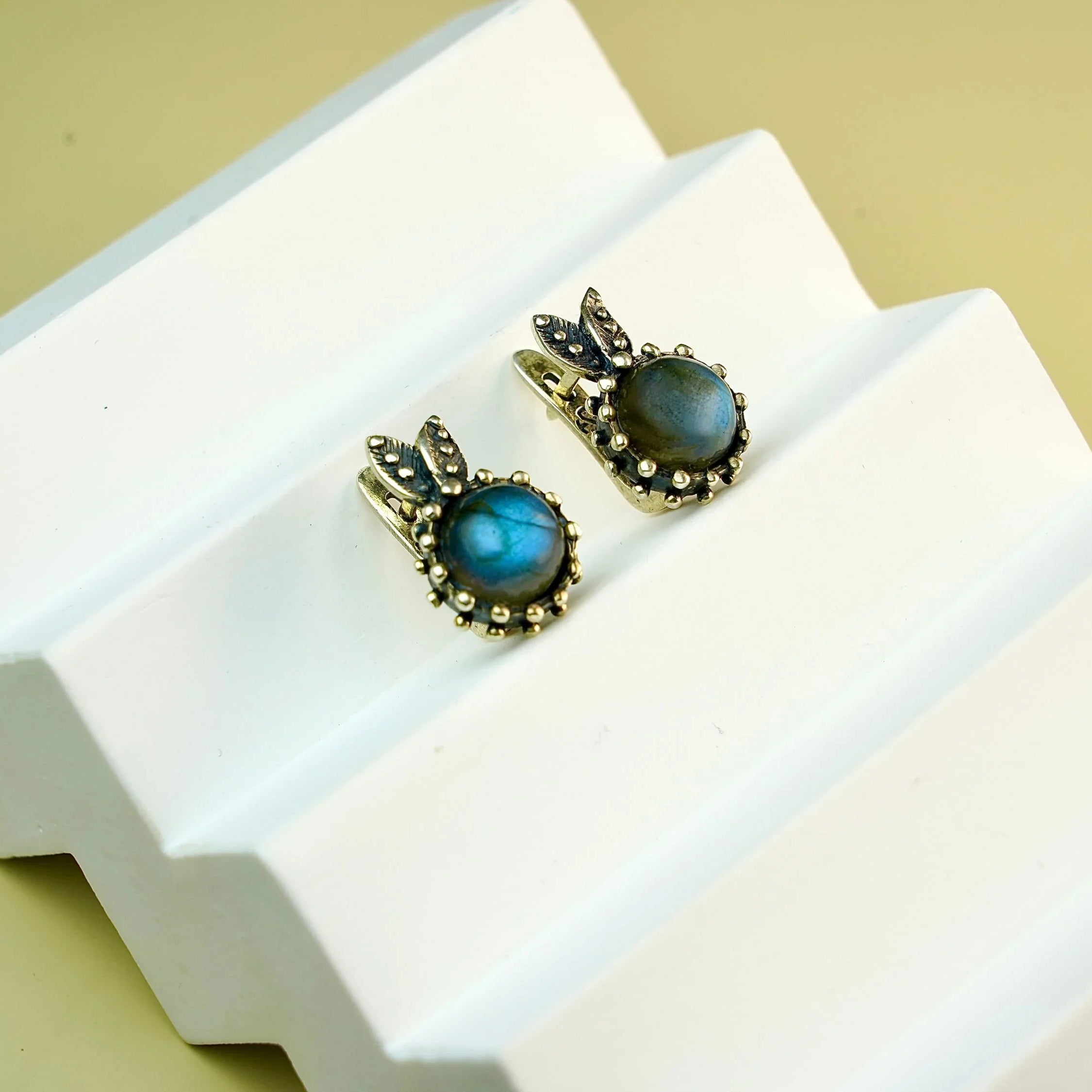Labradorite earrings on white display stand aesthetic minimalist jewelry styling