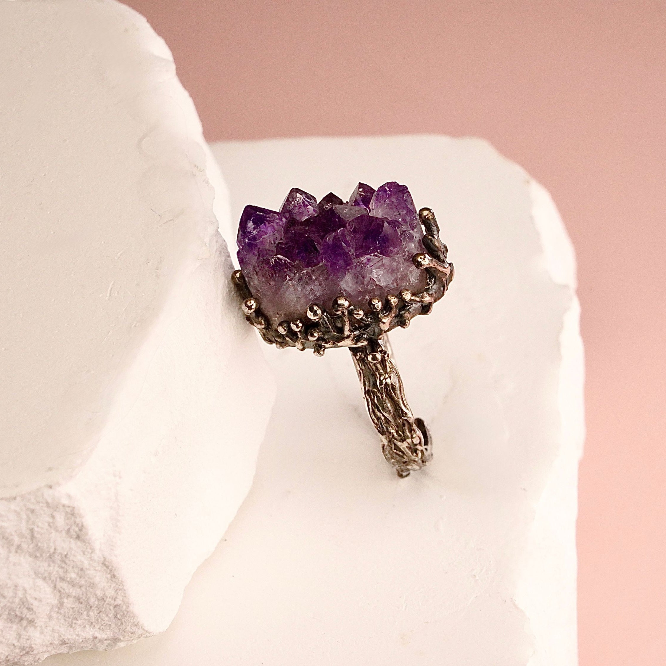 Close up raw amethyst crystal texture purple gemstone detail adjustable sterling silver ring