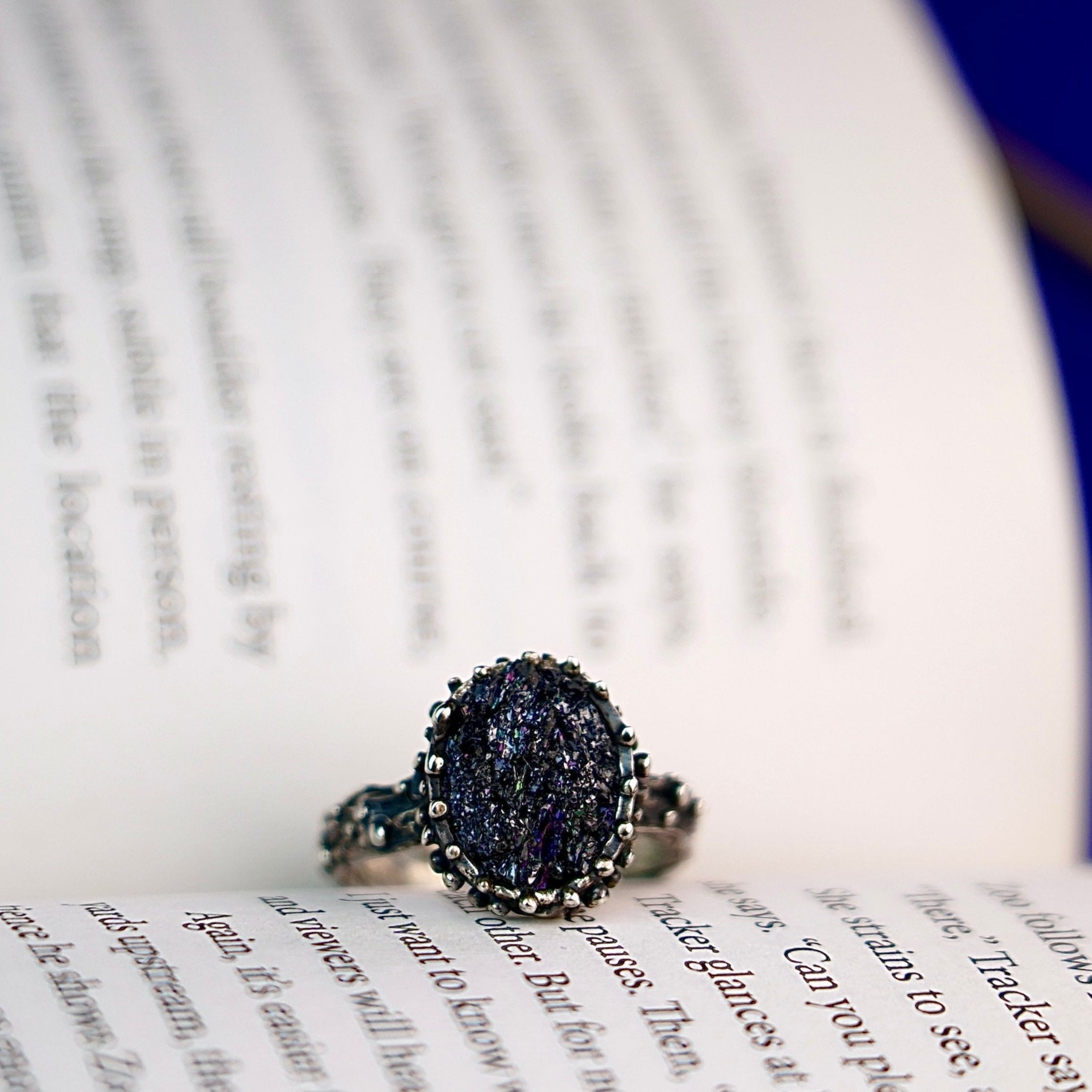 Close up raw tourmaline stone texture black crystal detail adjustable sterling silver ring