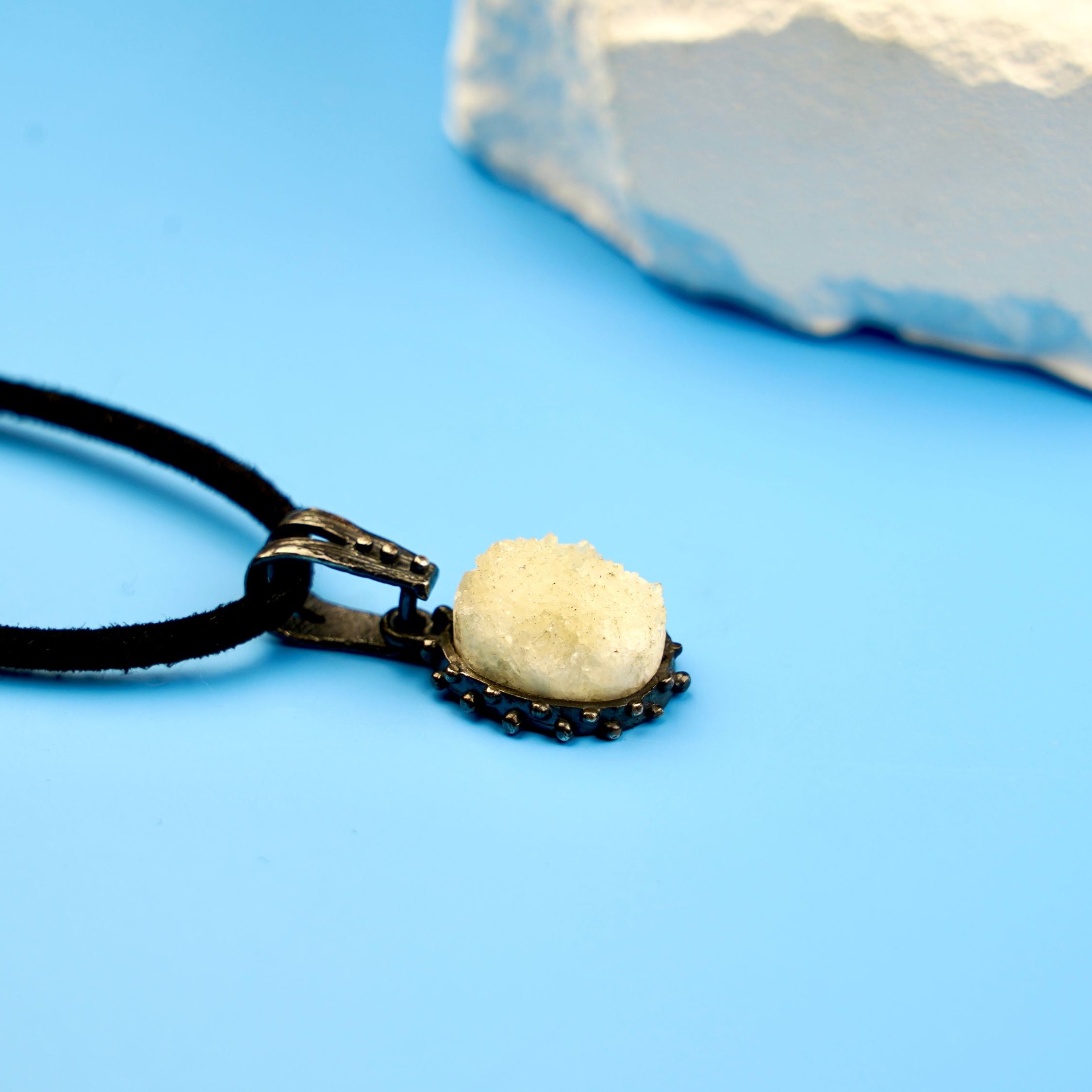 moonstone pendant close up glowing gemstone silver necklace