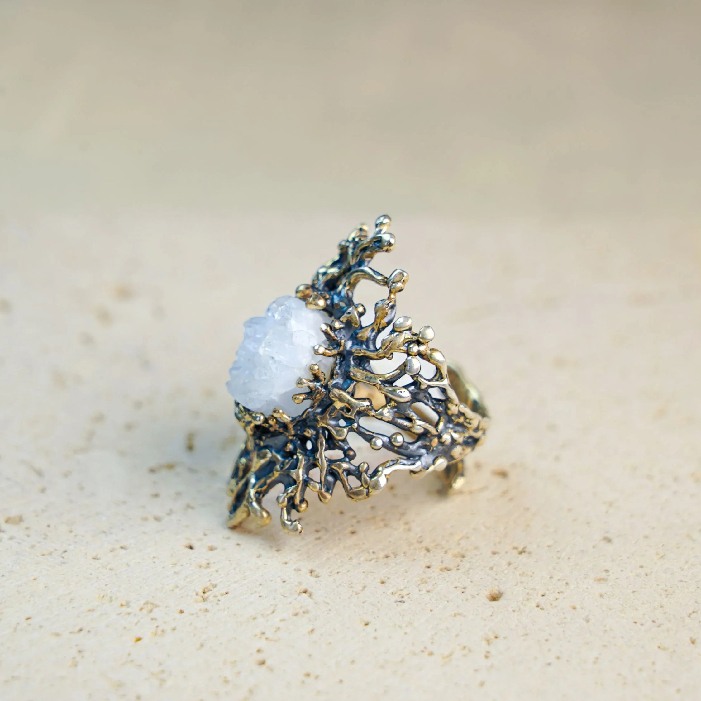 Moonstone ring angled view organic textured sterling silver artistic design
