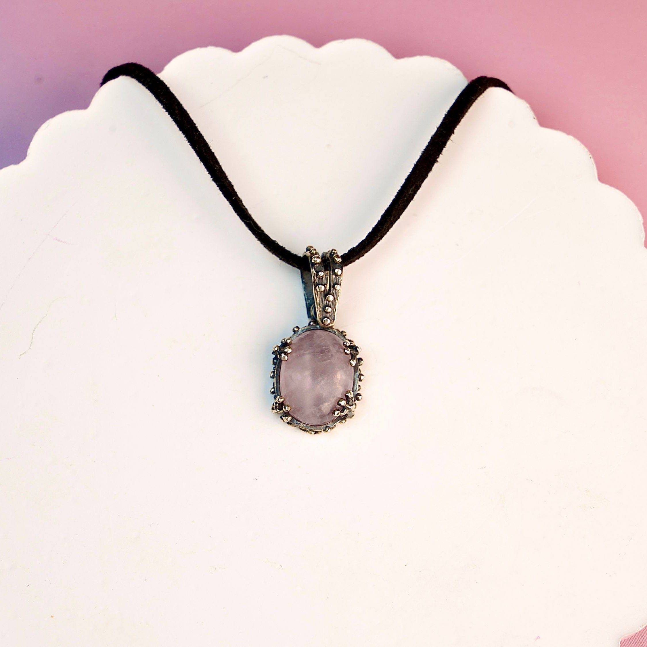 Rose quartz necklace clean background minimal pink gemstone pendant silver