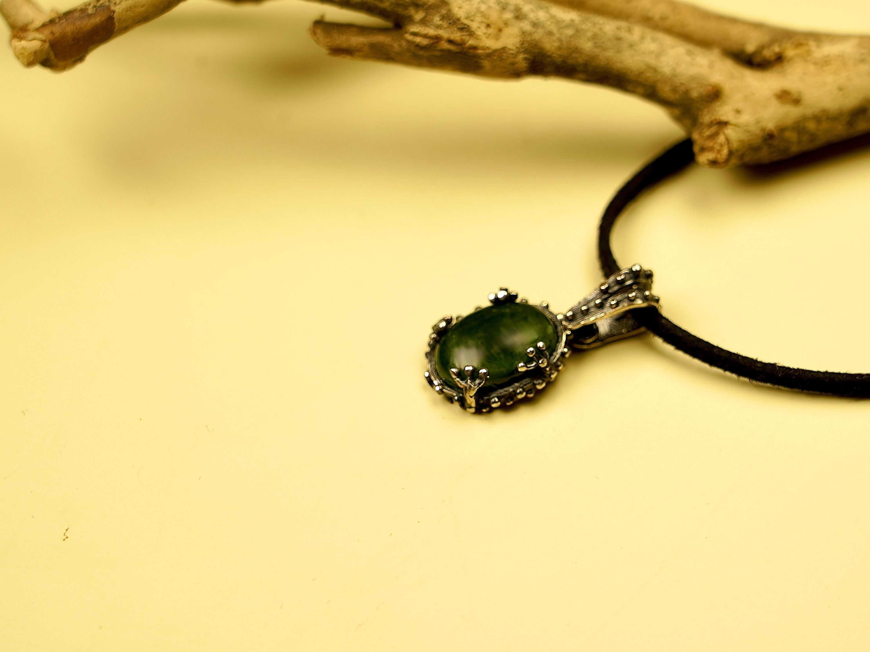 jade necklace clean minimal background green pendant jewelry