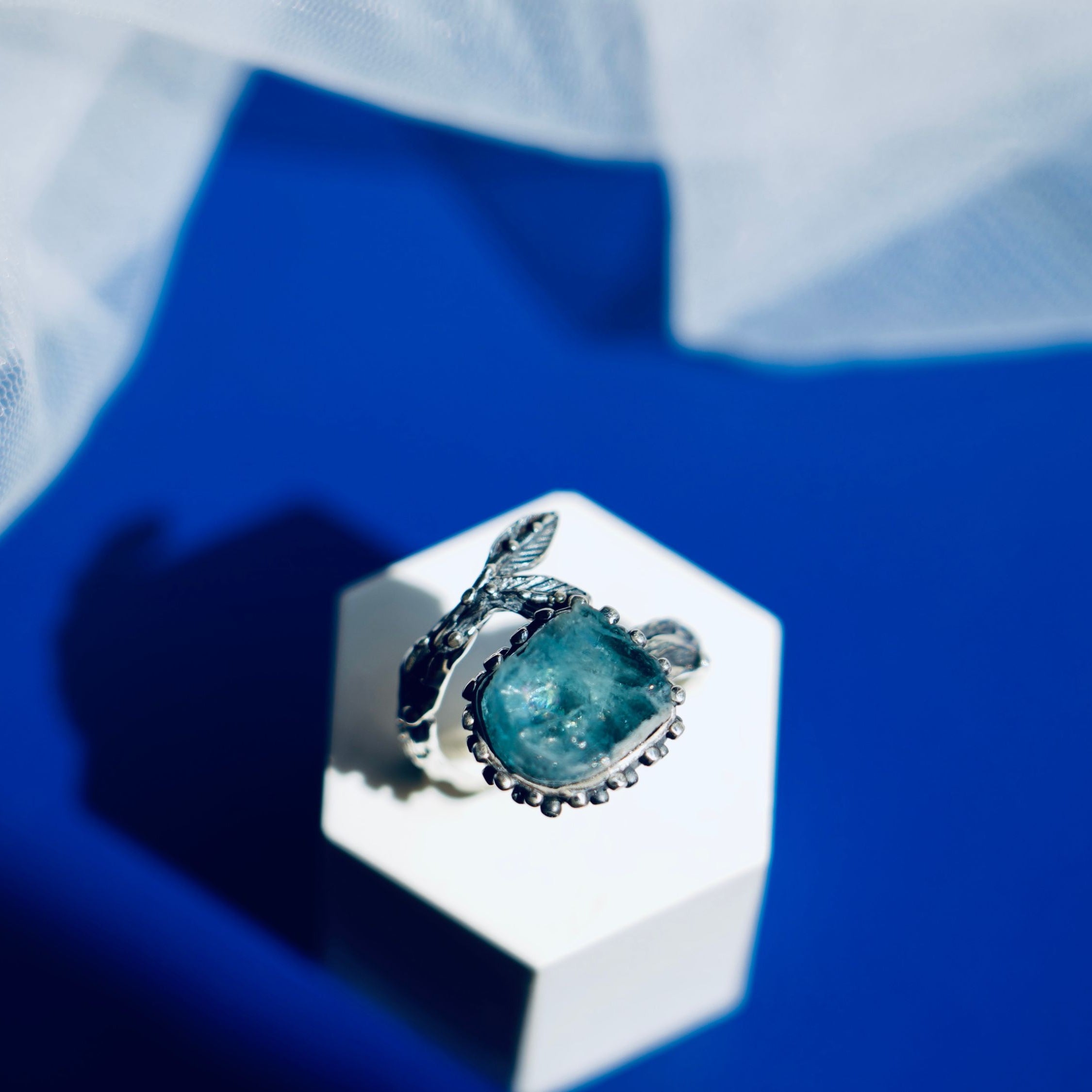 Clean front view aquamarine ring adjustable silver statement jewelry minimal composition