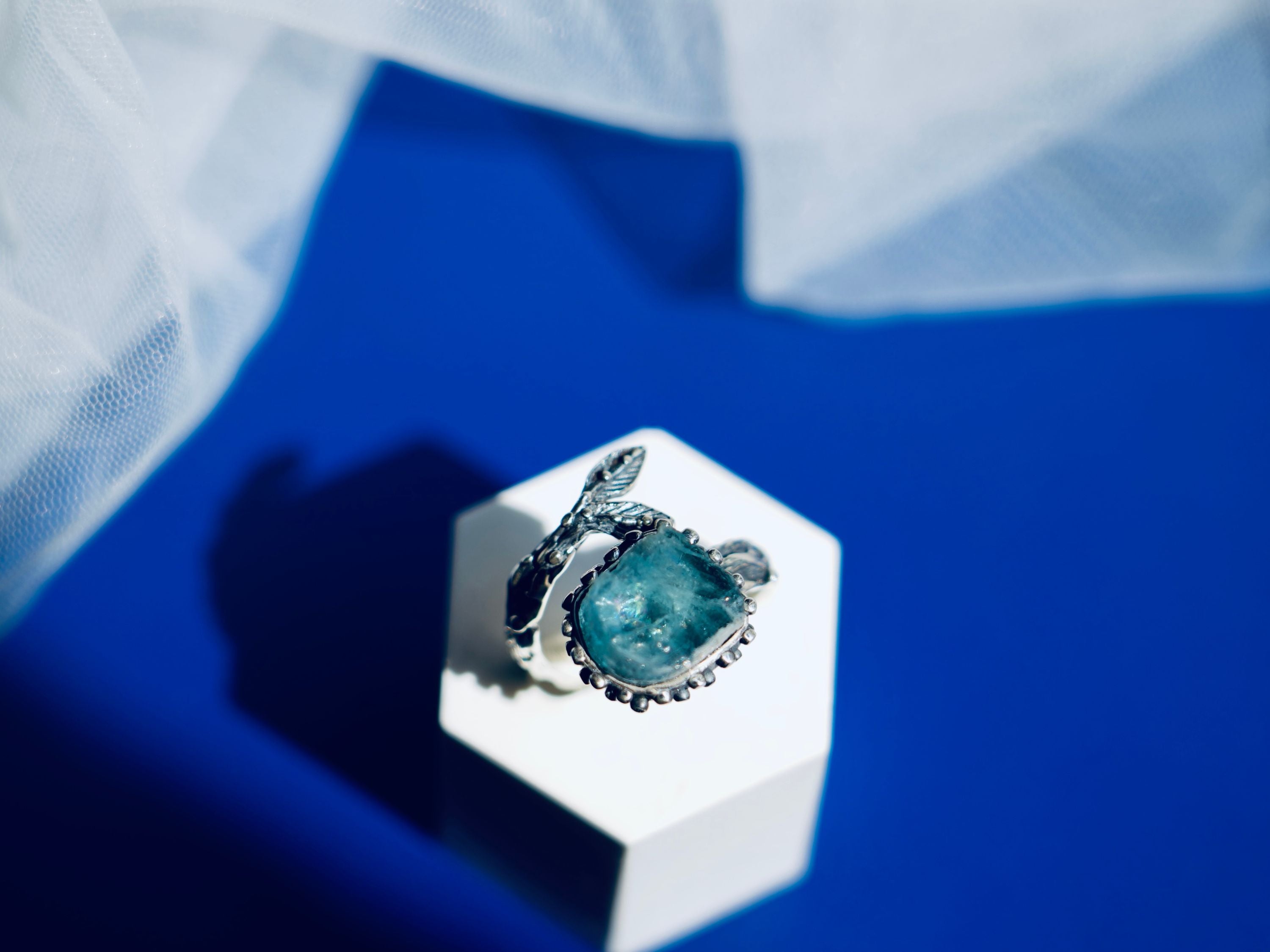 Clean front view aquamarine ring adjustable silver statement jewelry minimal composition
