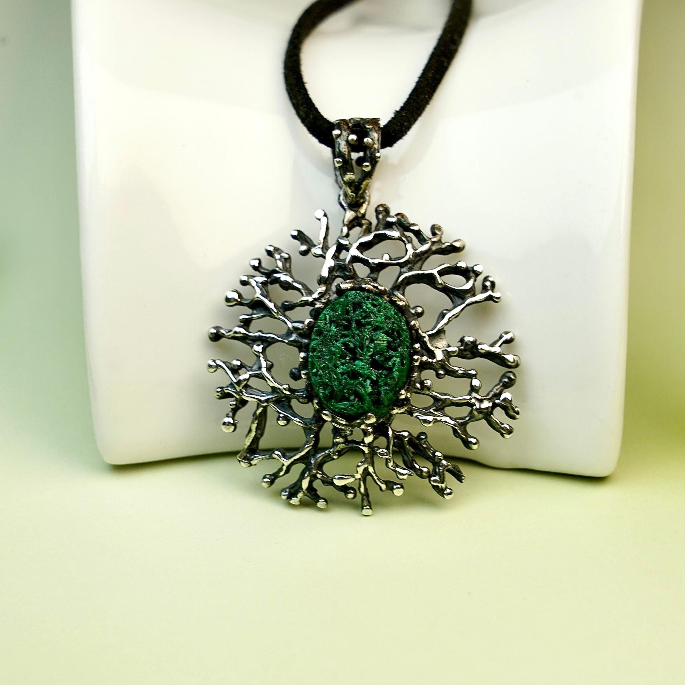 Malachite necklace clean background minimal green gemstone pendant sterling silver