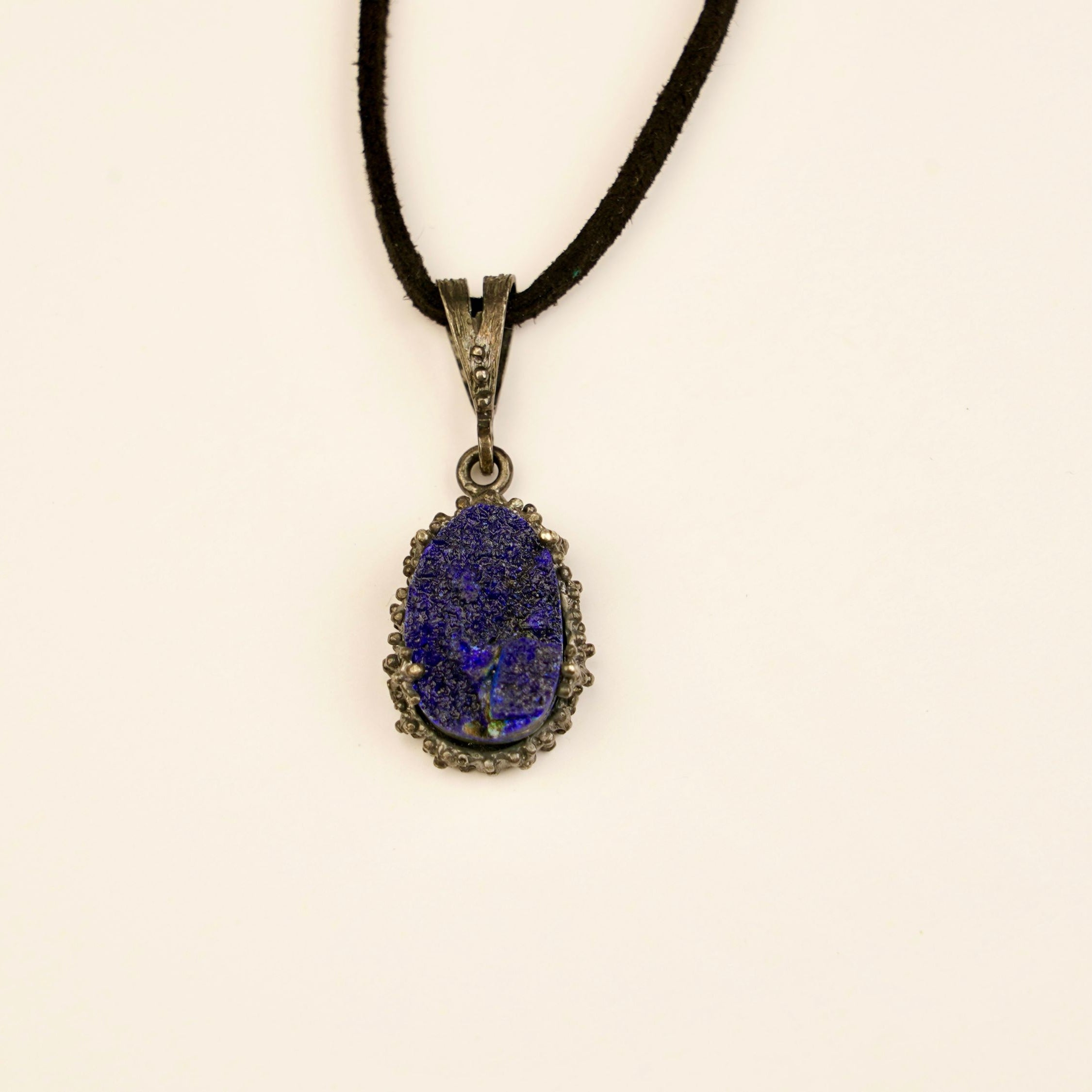 lapis lazuli pendant necklace front view, raw crystal silver design