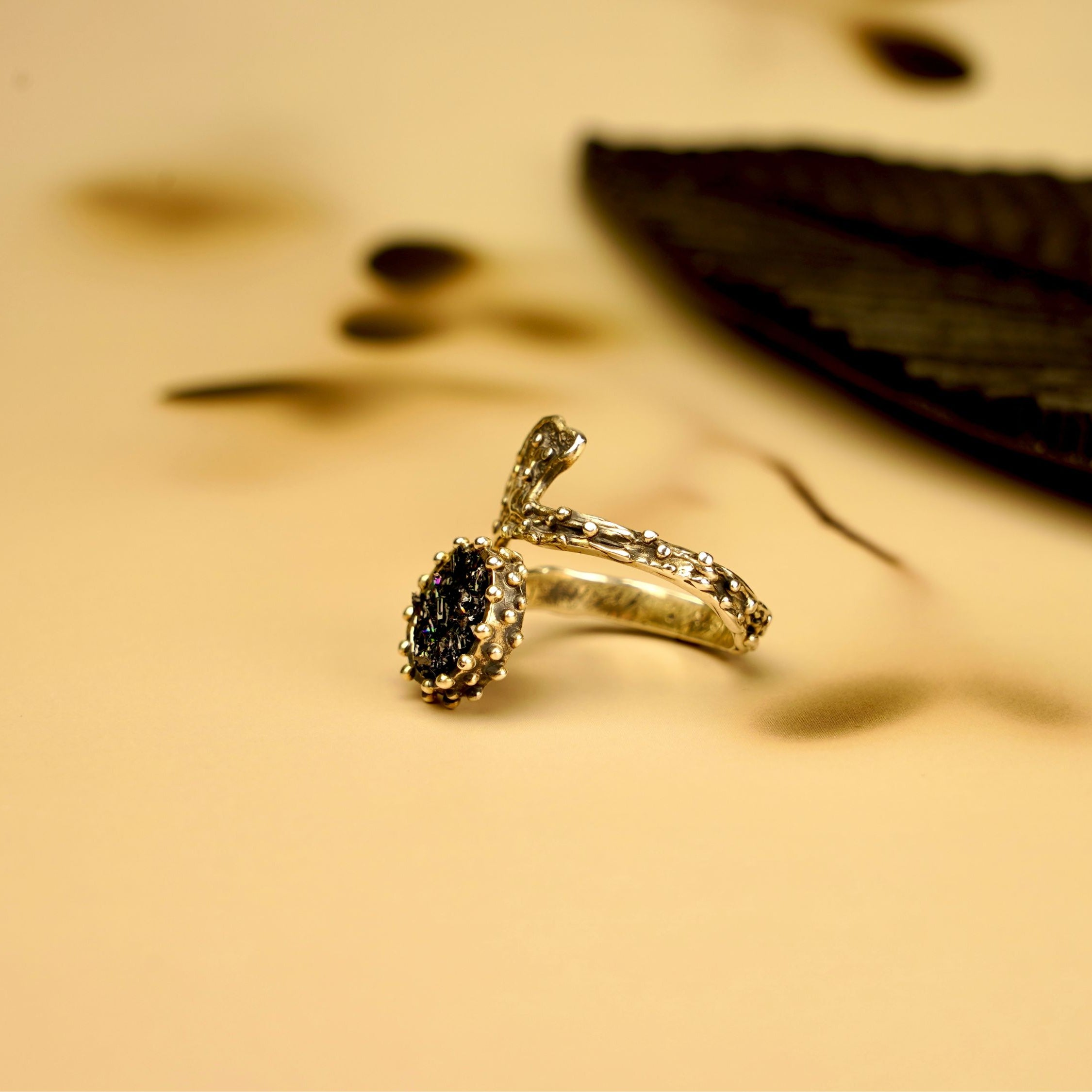 Angle view black tourmaline adjustable ring sculptural silver design unique gemstone ring