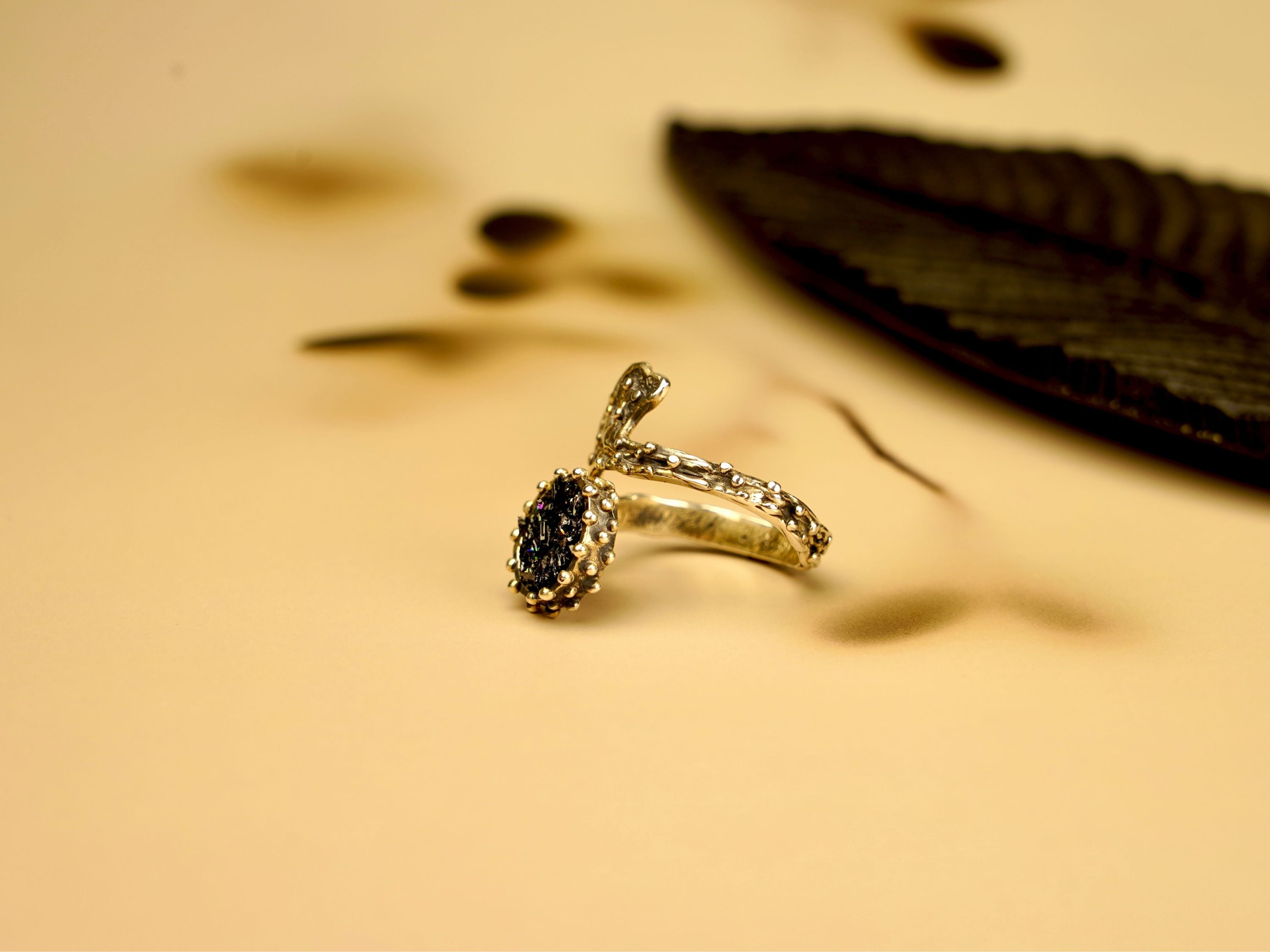 Angle view black tourmaline adjustable ring sculptural silver design unique gemstone ring