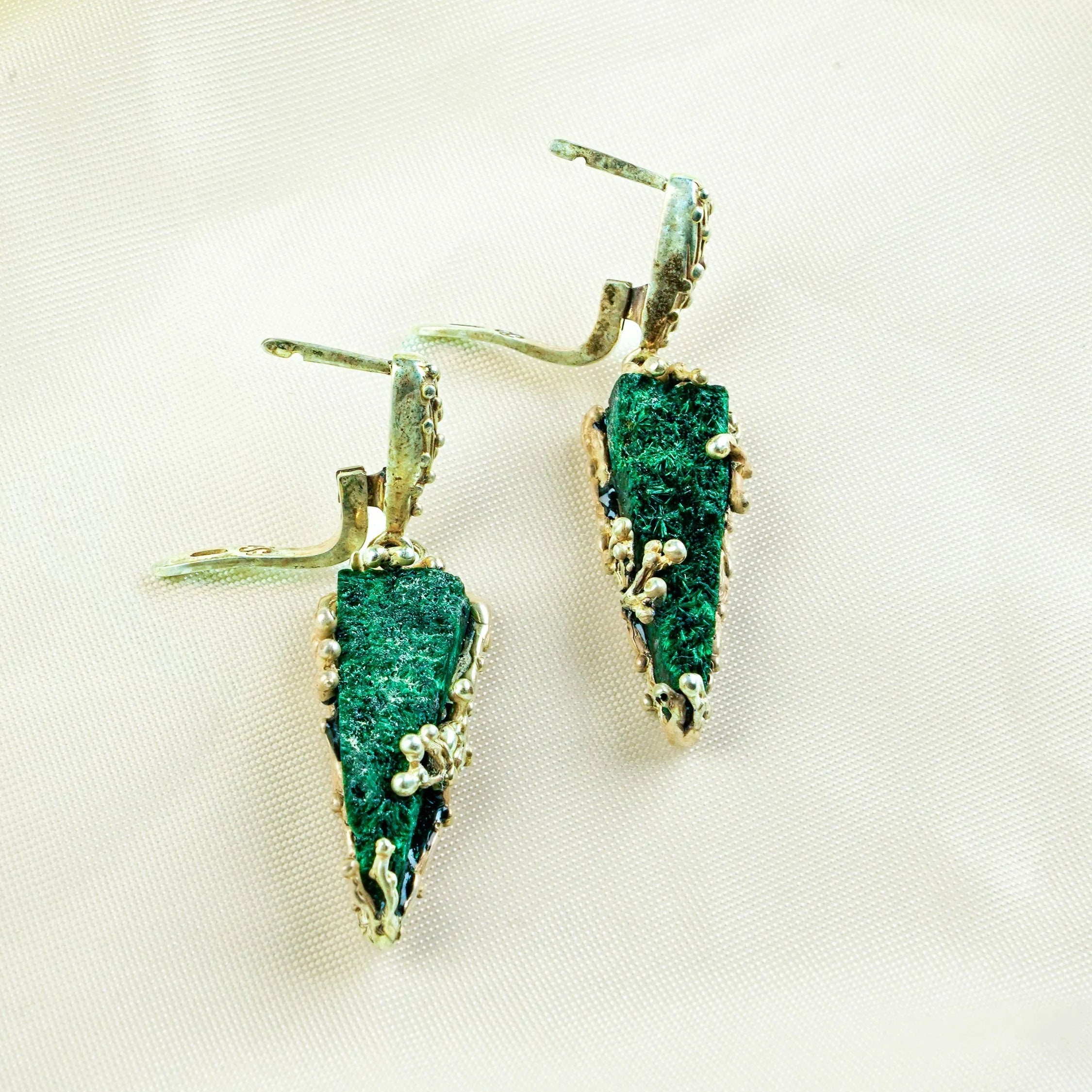 Malachite earrings angled detail green gemstone sterling silver handcrafted