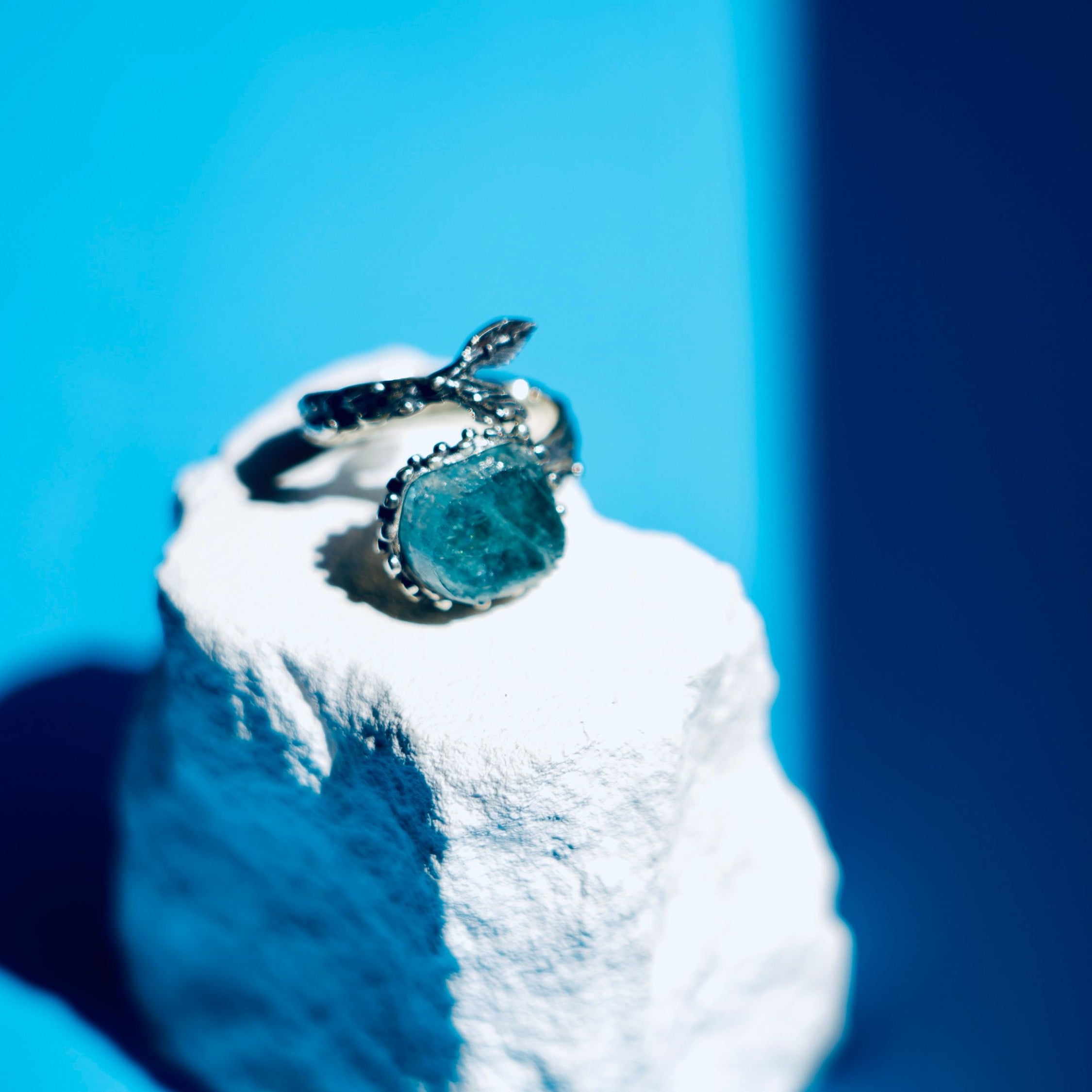 Angle view aquamarine adjustable ring ocean blue stone silver design statement jewelry