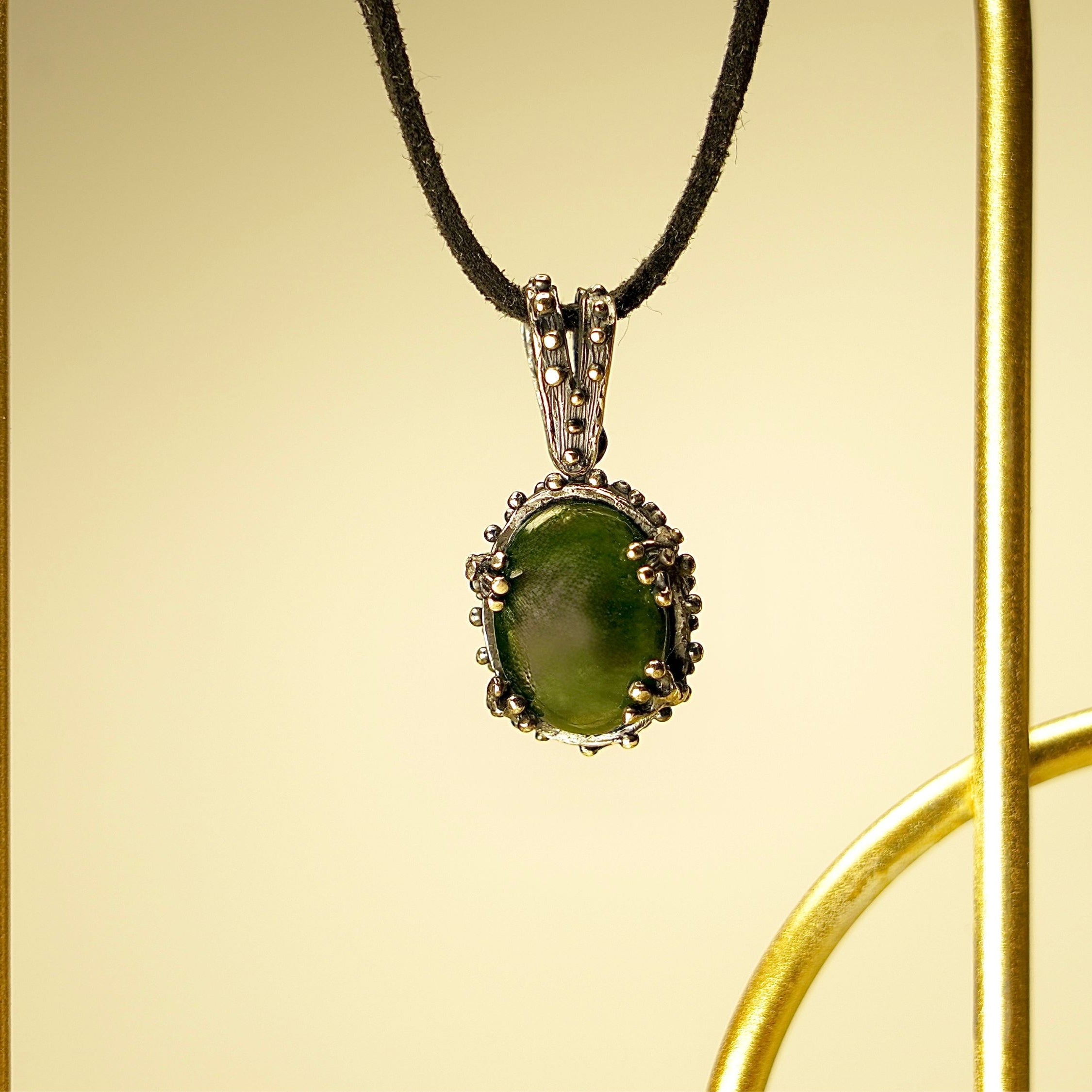 jade necklace angle view minimalist green gemstone pendant