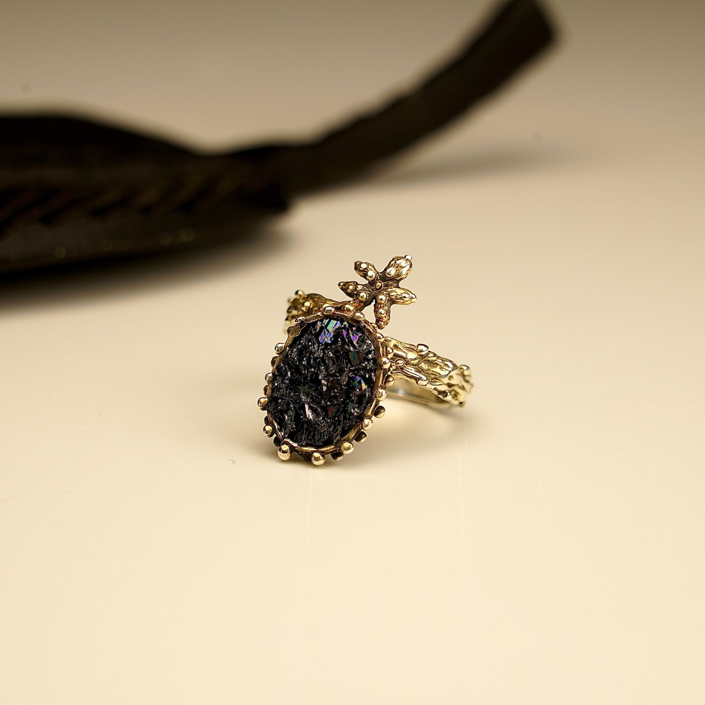 Angle view black tourmaline ring sculptural silver design artistic statement ring