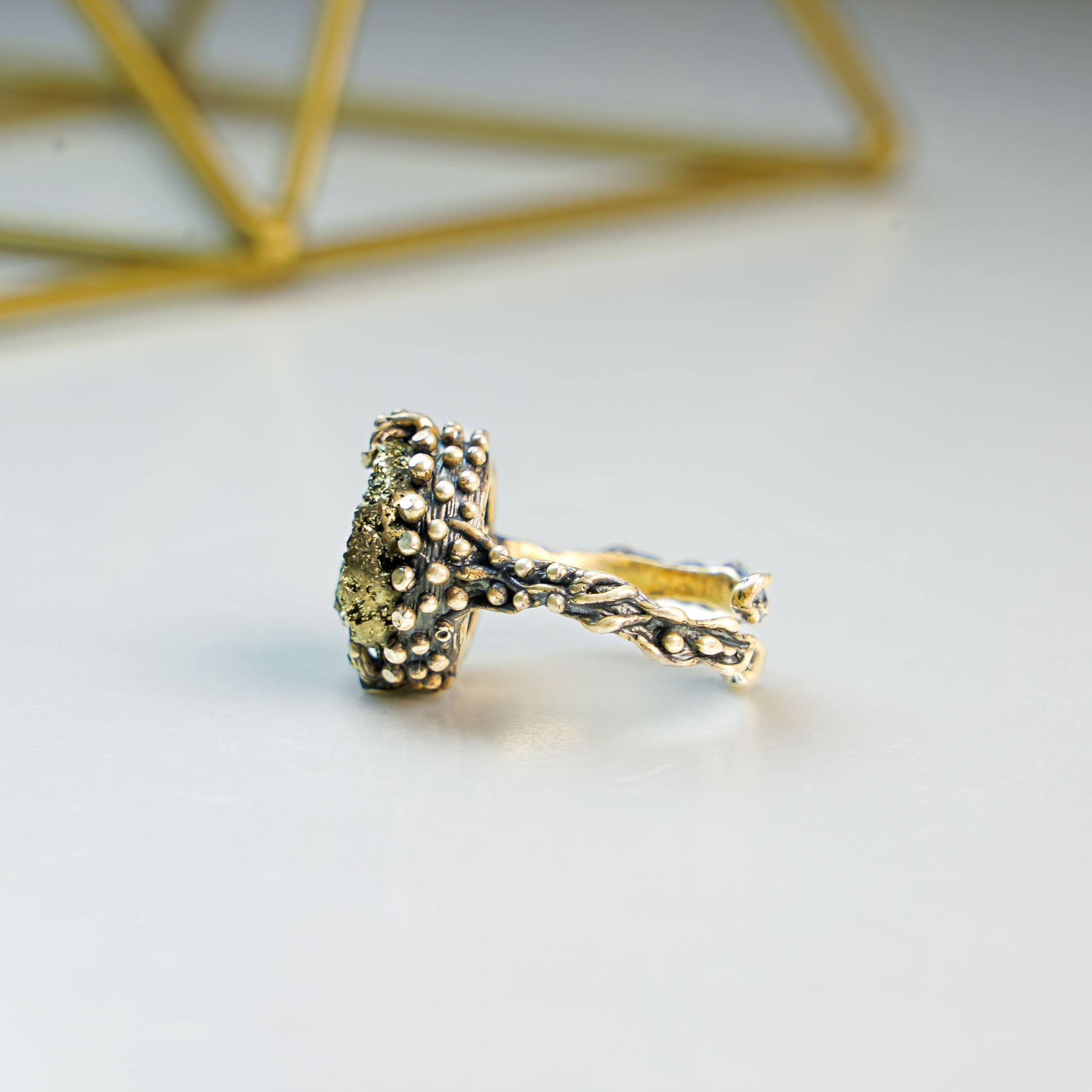 Pyrite ring side view sterling silver band raw gold stone statement design