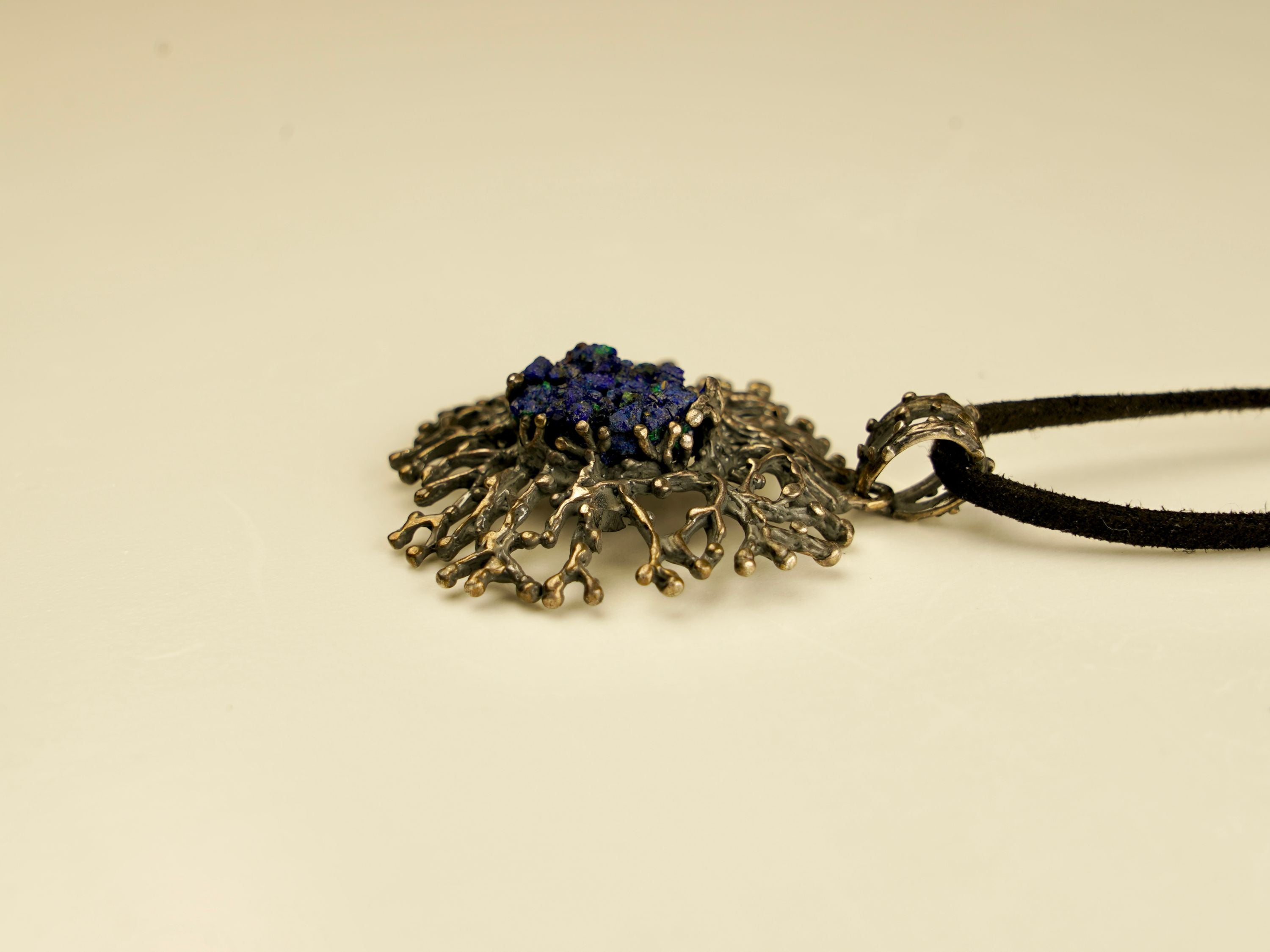 lapis lazuli necklace side angle blue gemstone statement pendant