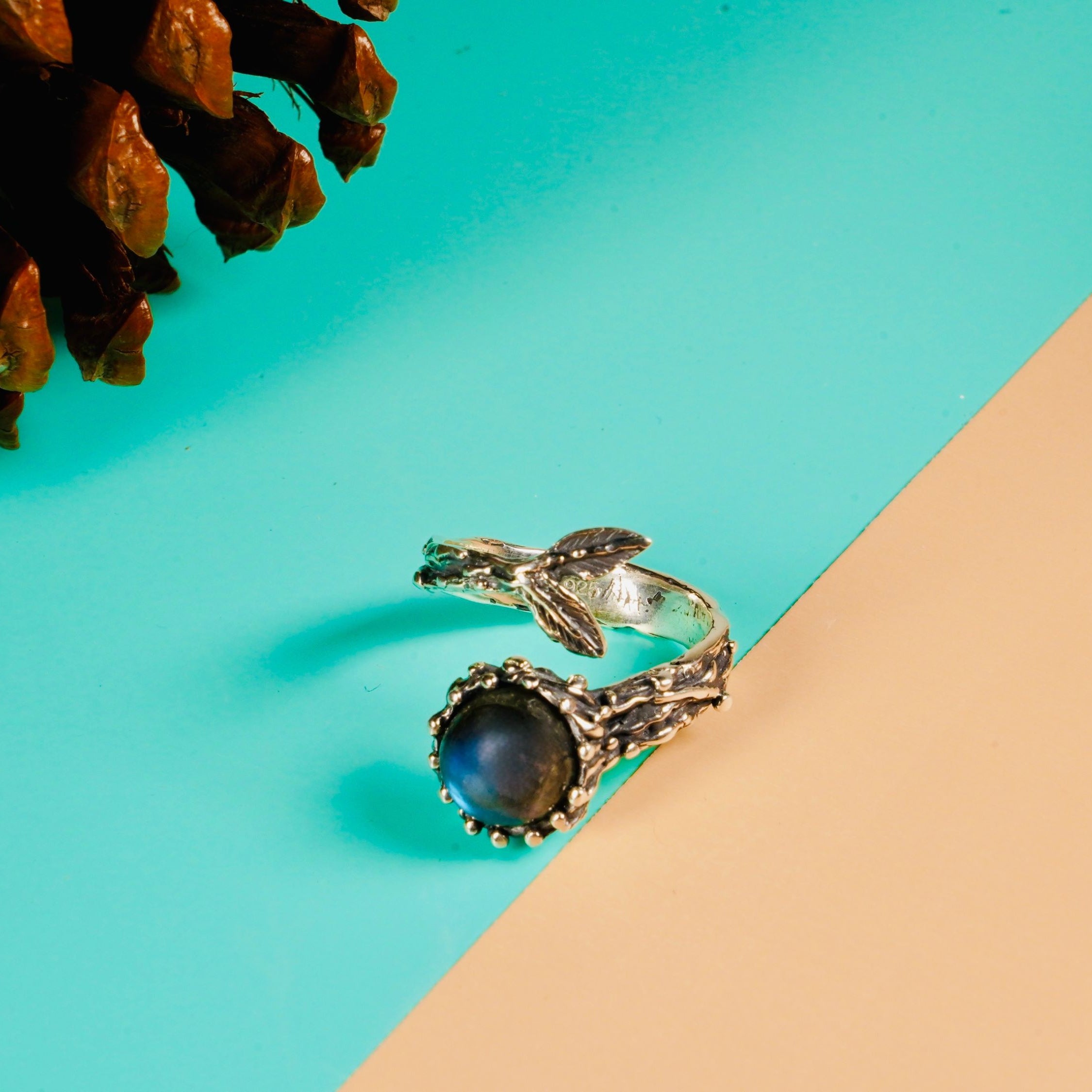 Angle view labradorite adjustable ring blue gemstone silver design modern statement jewelry