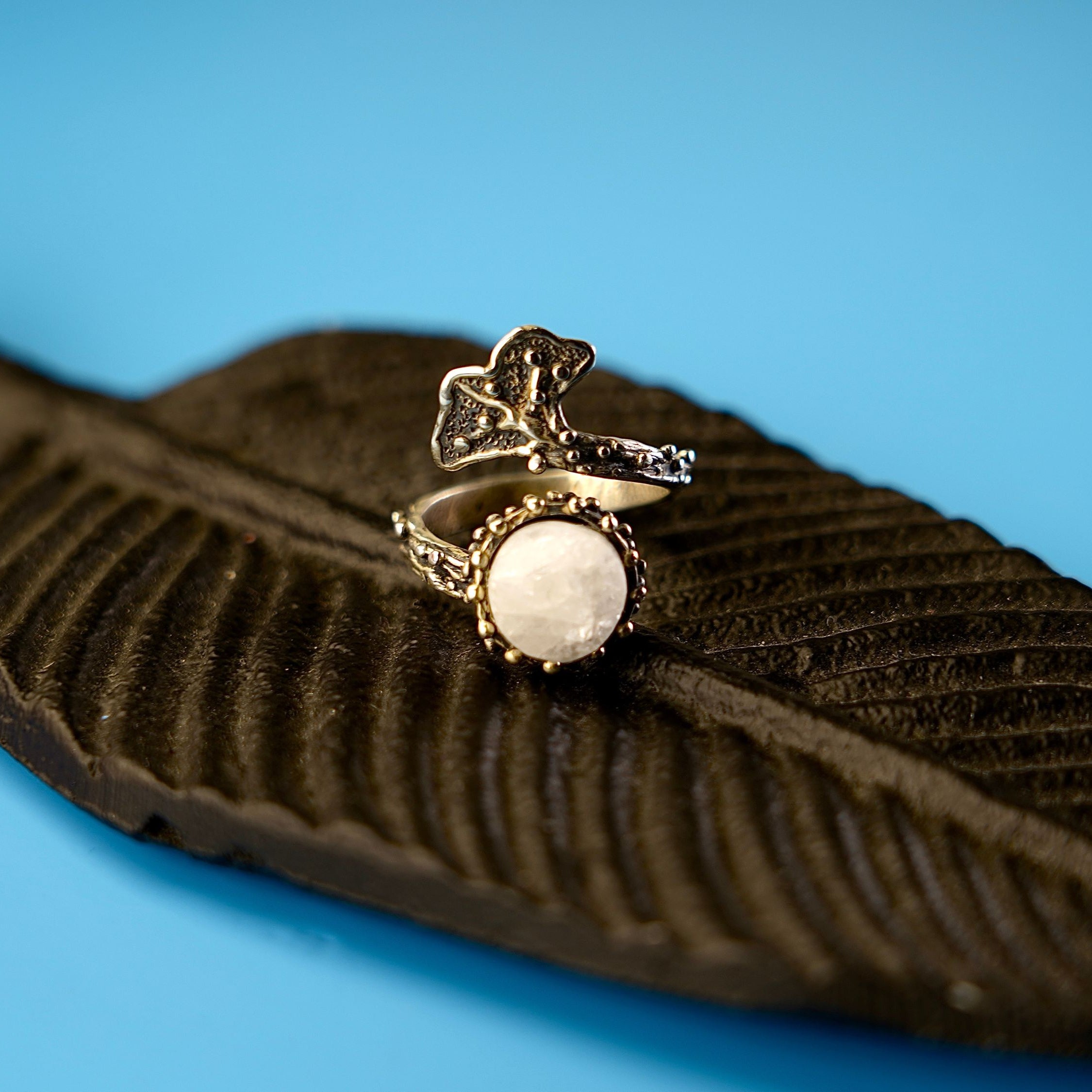 Angle view moonstone adjustable ring polished stone silver design elegant statement jewelry