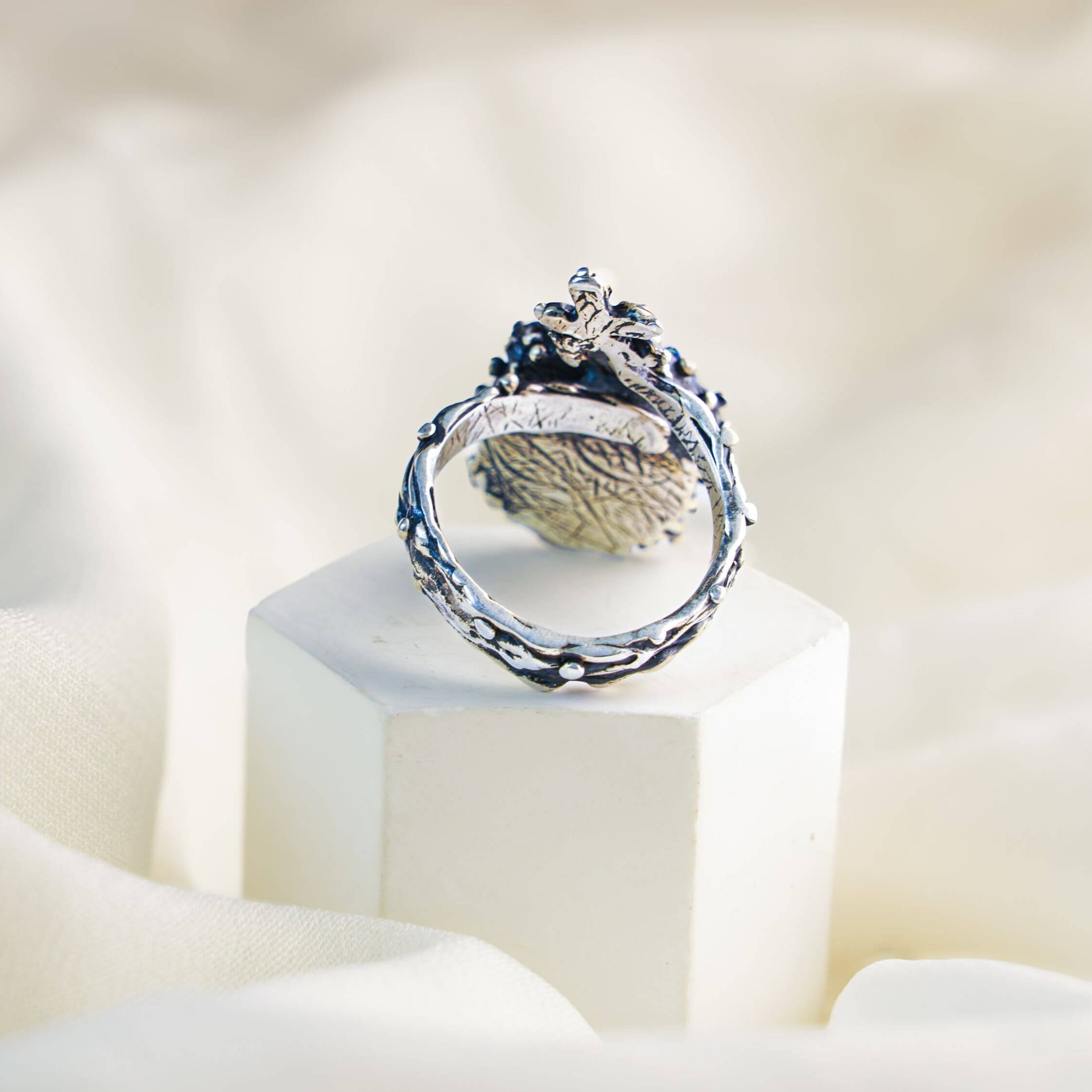 Close-up of the adjustable open-back silver twig band for the lapis lazuli statement ring
