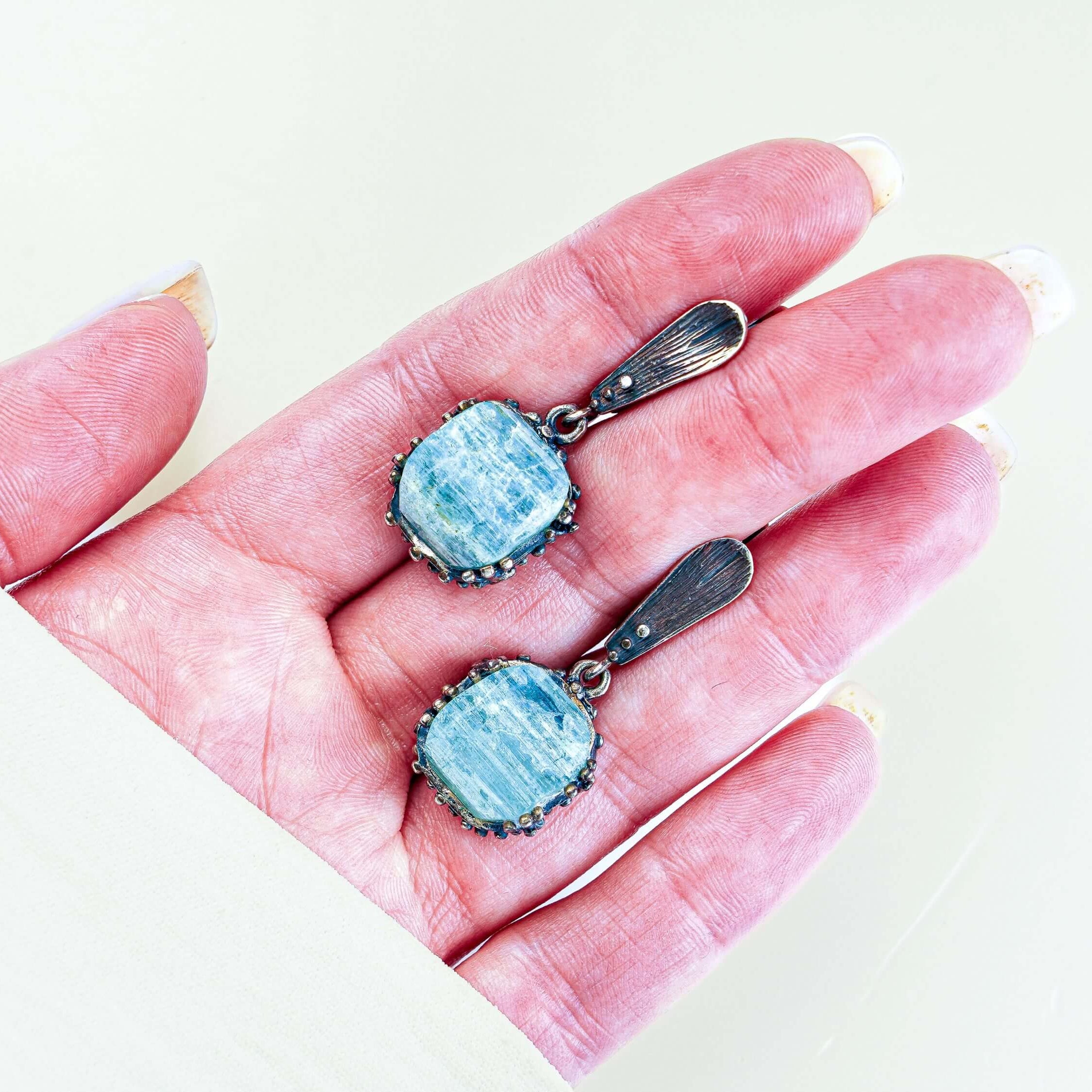 Side profile aquamarine earrings length and structure silver drop earrings detail