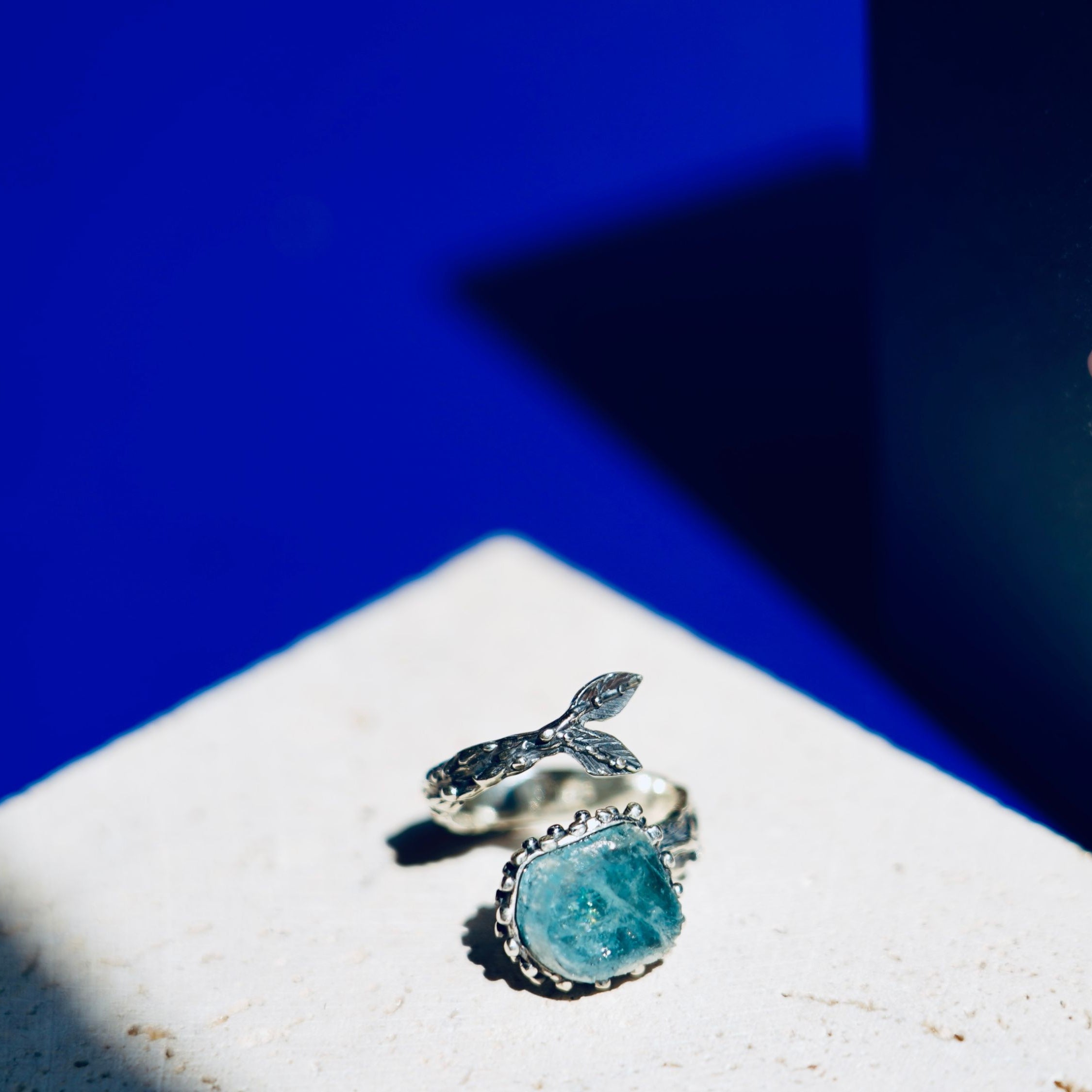 Side profile aquamarine ring adjustable band structure sterling silver detail