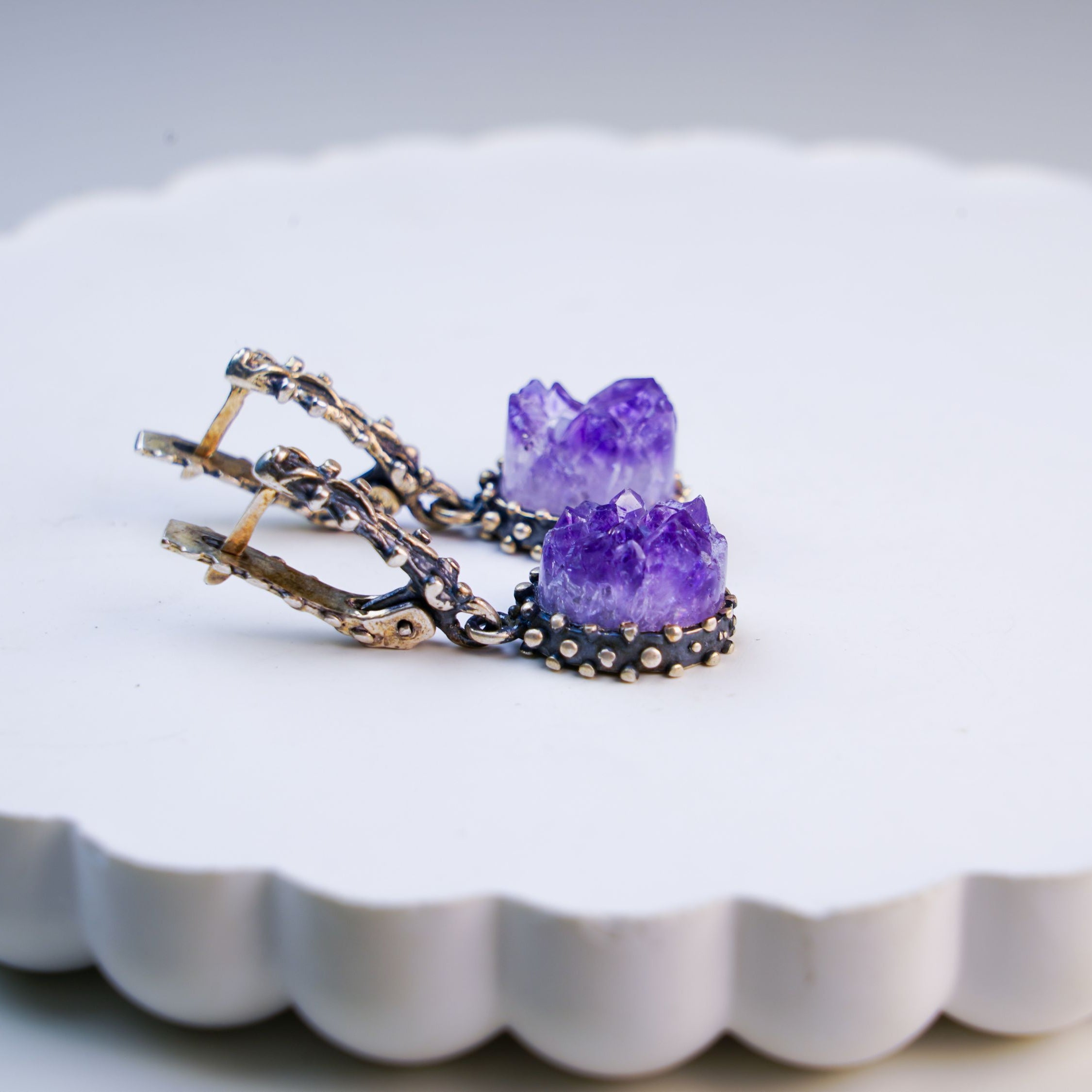 amethyst earrings side view silver setting gemstone drop earrings