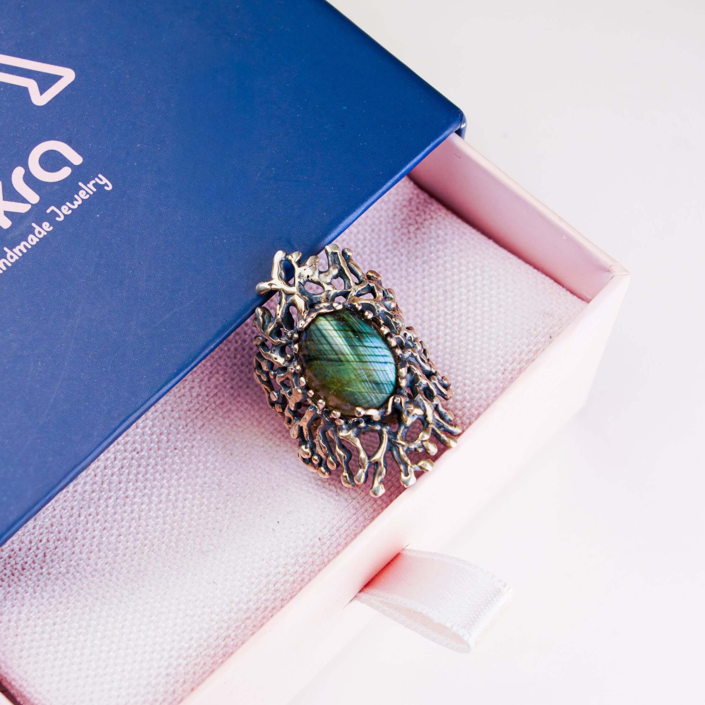 Gothic labradorite jewelry piece presented in Akra Gems signature luxury blue gift box