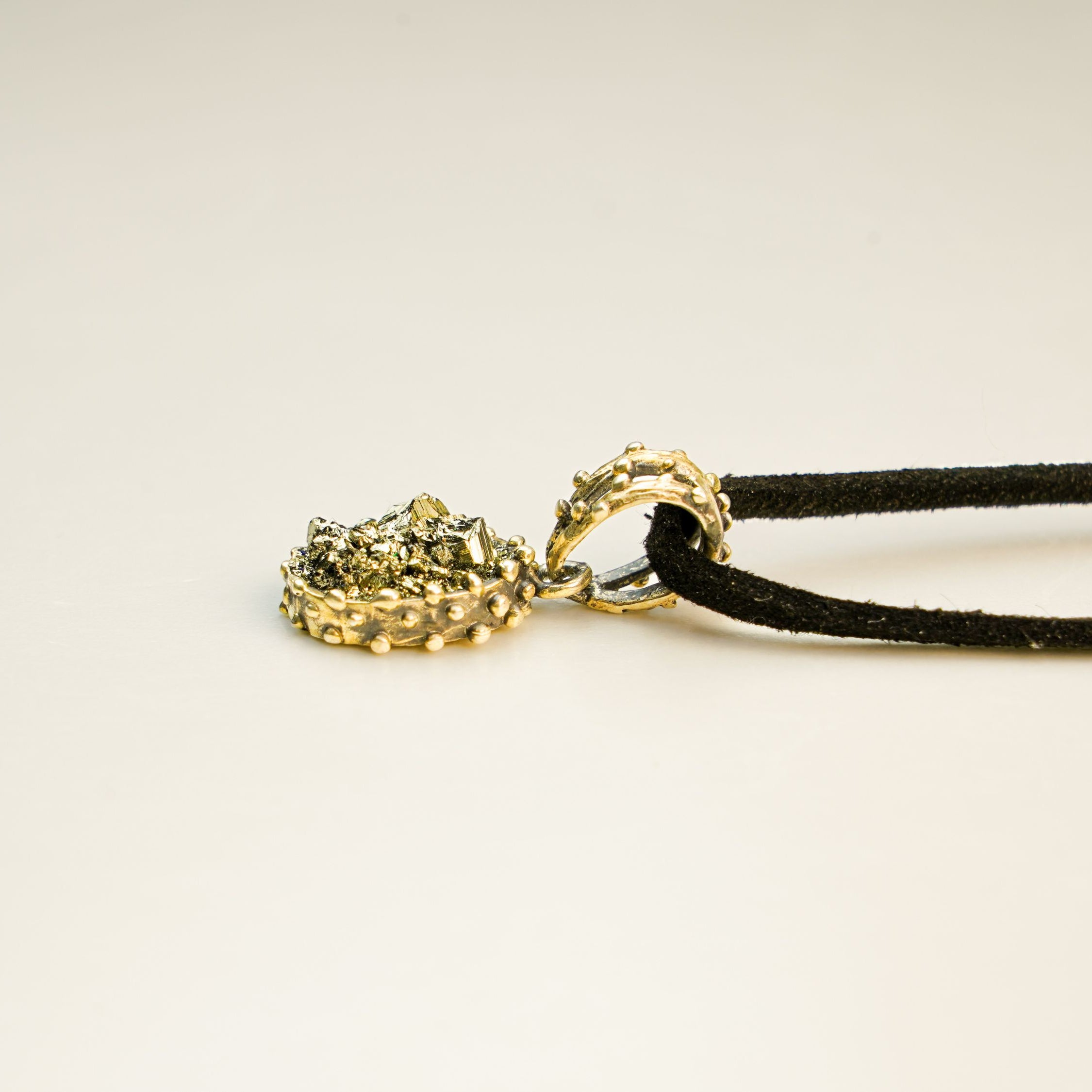 pyrite necklace side profile pendant thickness and setting detail
