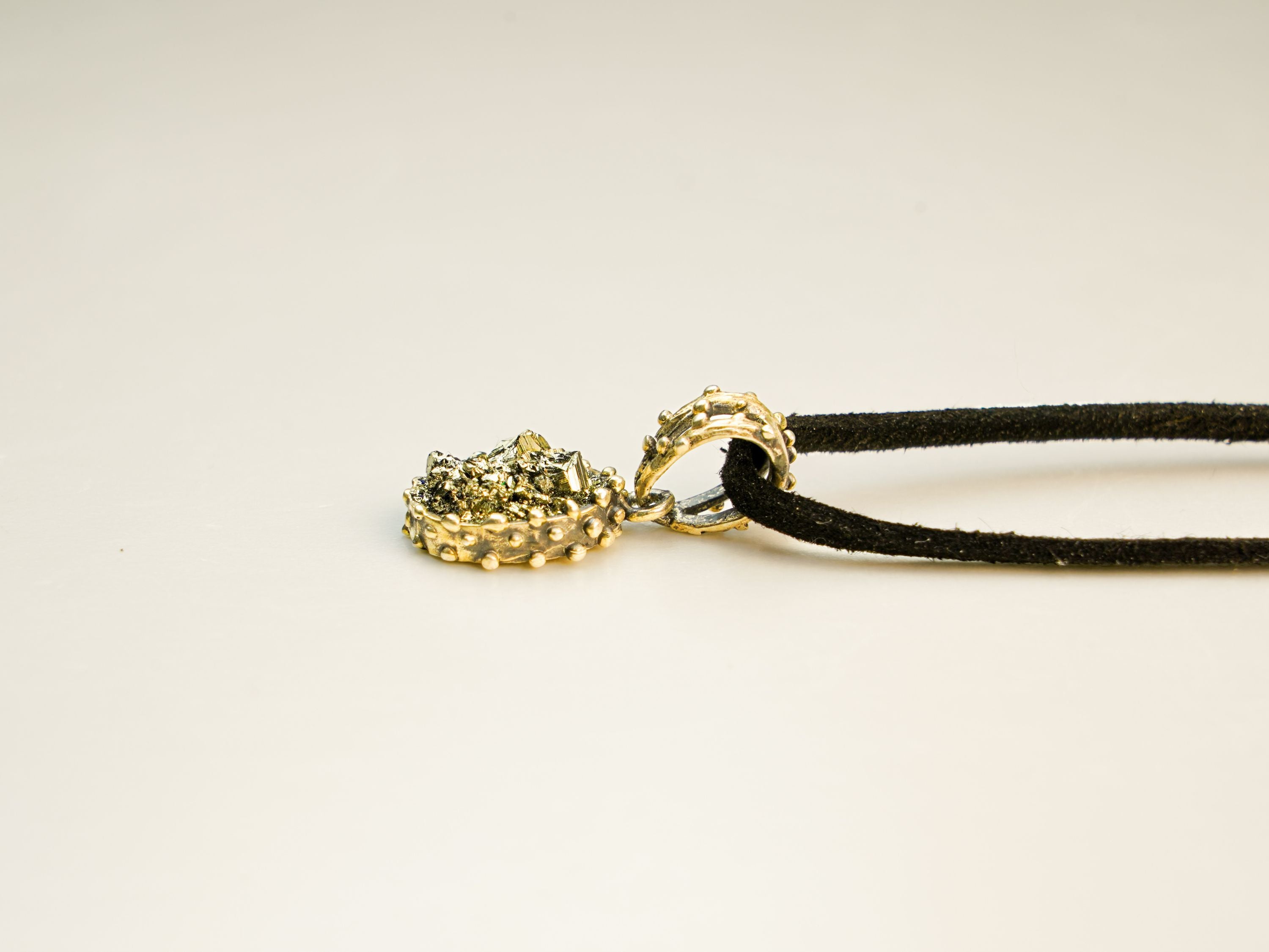pyrite necklace side profile pendant thickness and setting detail