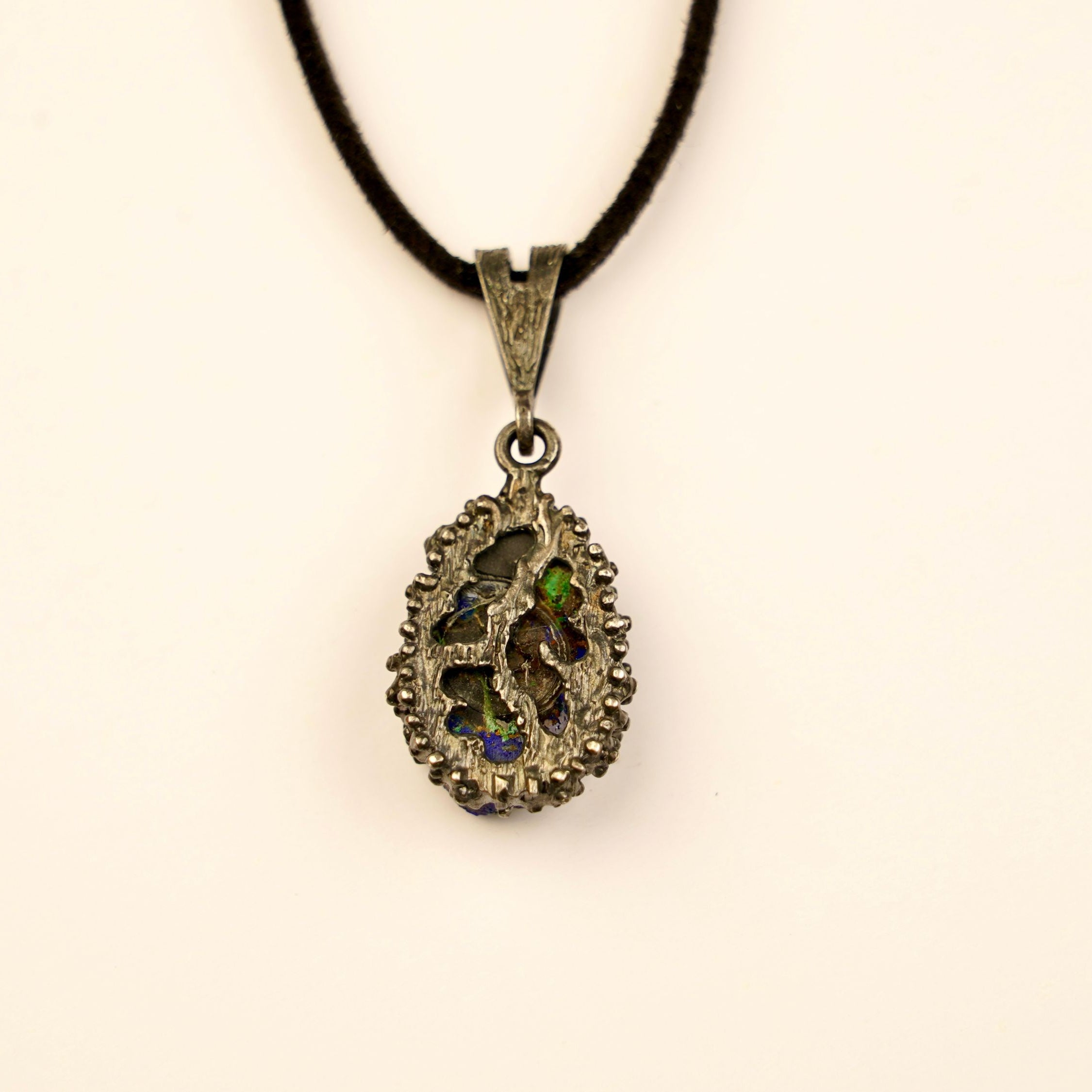 backside of lapis lazuli pendant, handcrafted sterling silver jewelry detail