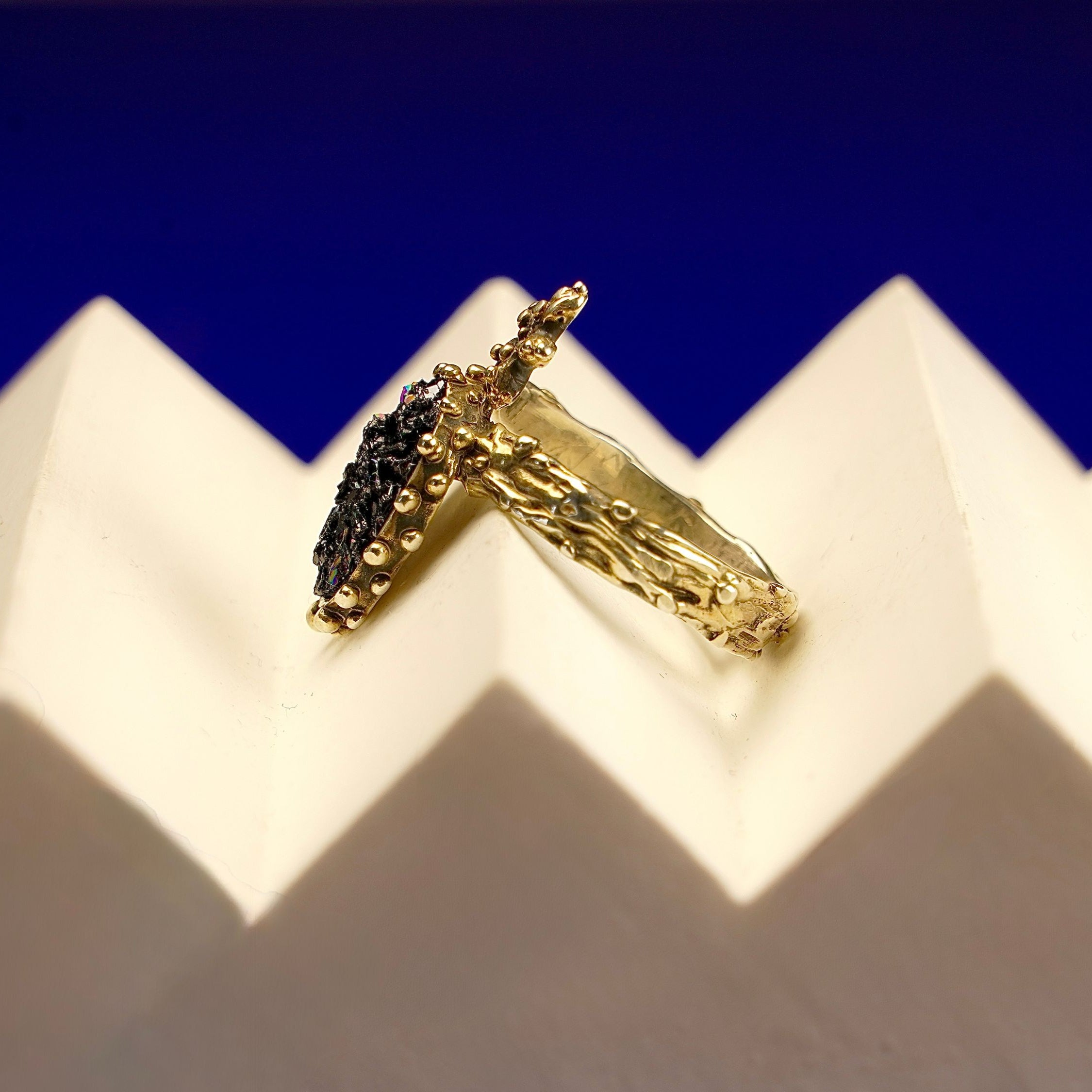 Backside tourmaline ring craftsmanship silver setting detailed view