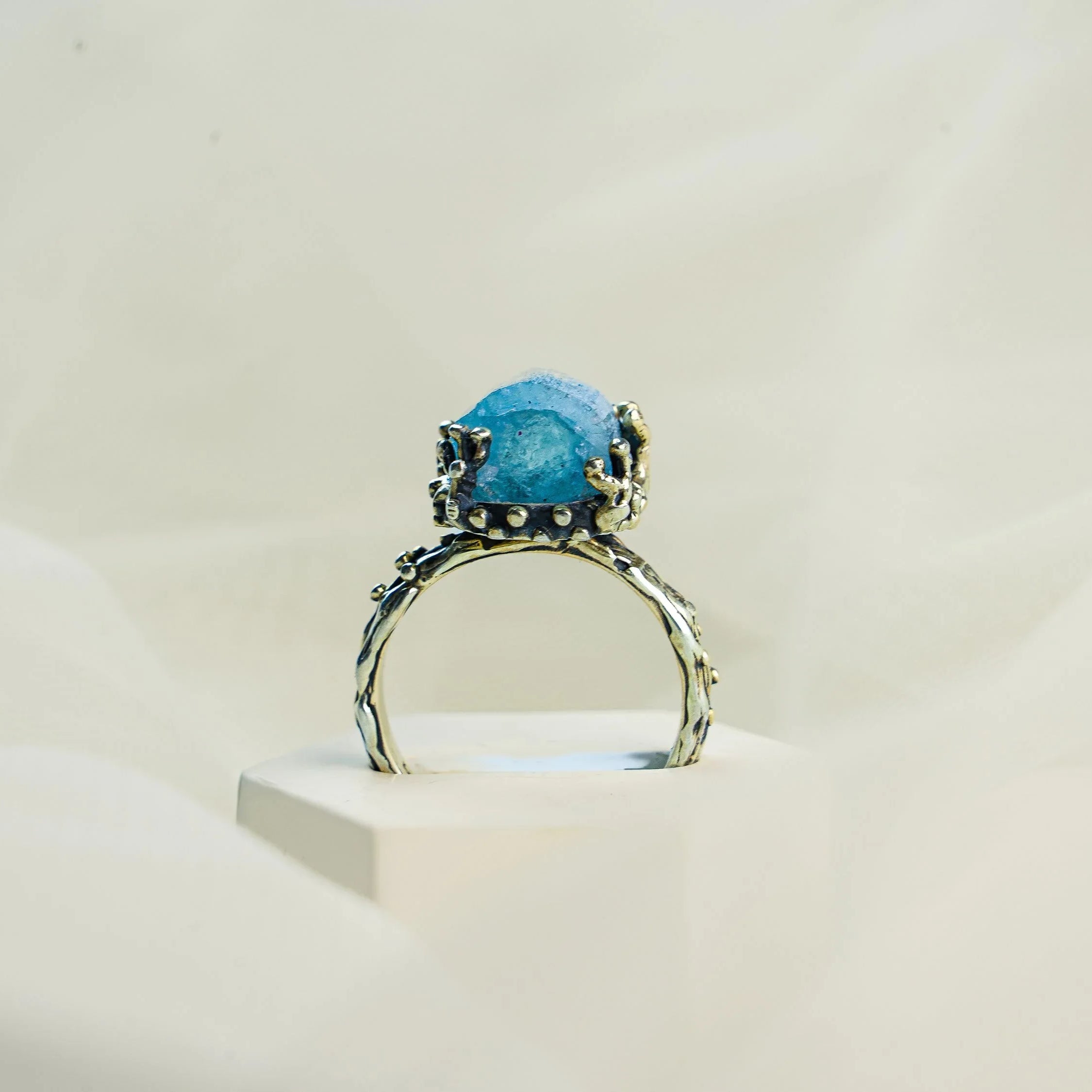 Aquamarine ring front standing view gemstone and band structure