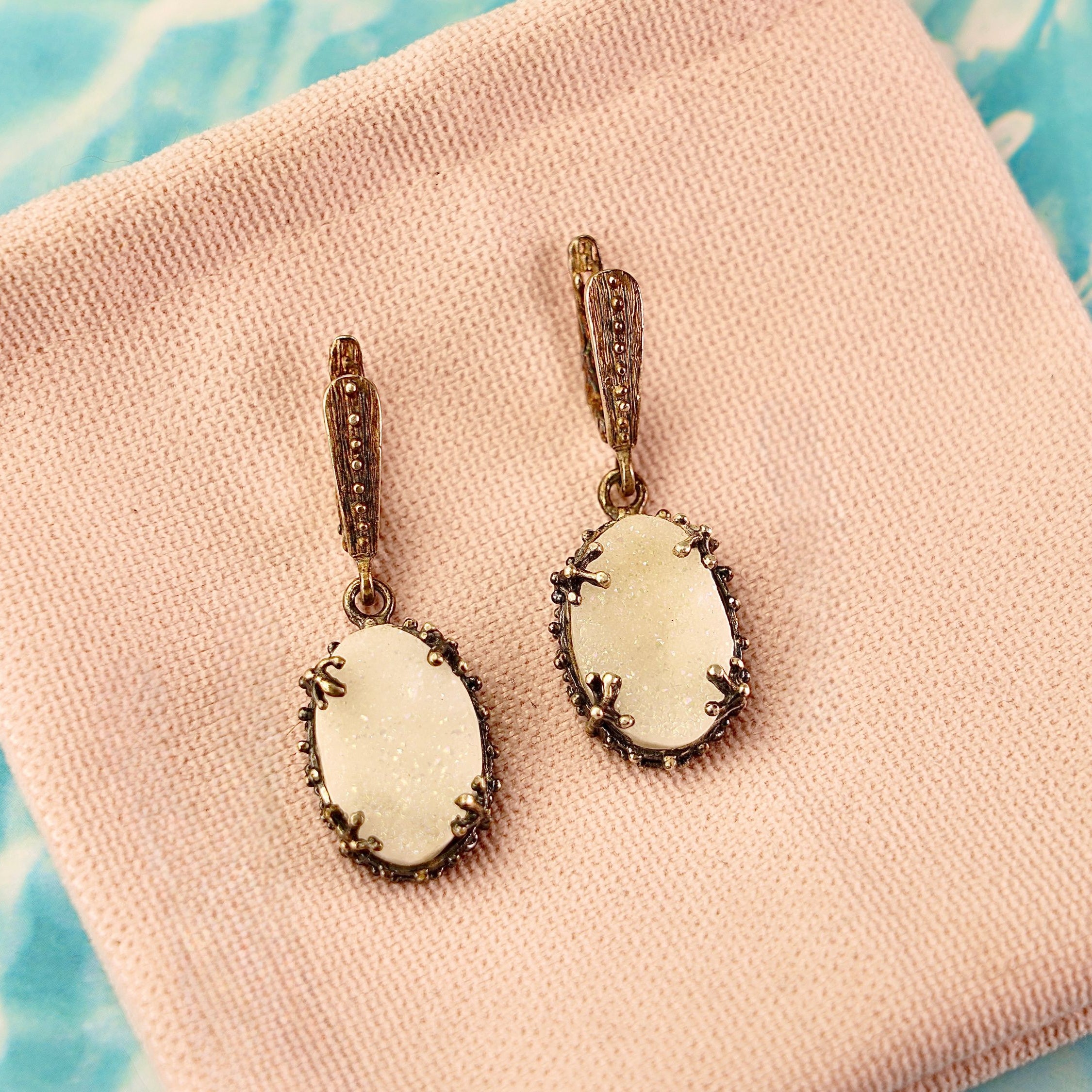 Moonstone drop earrings clean front view white gemstone elegant dangle earrings