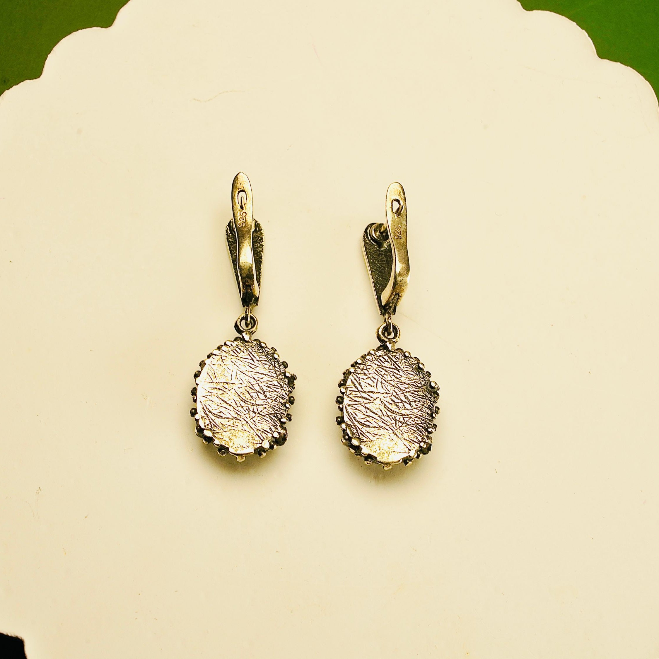 Backside jade earrings rear view leverback closure silver detail