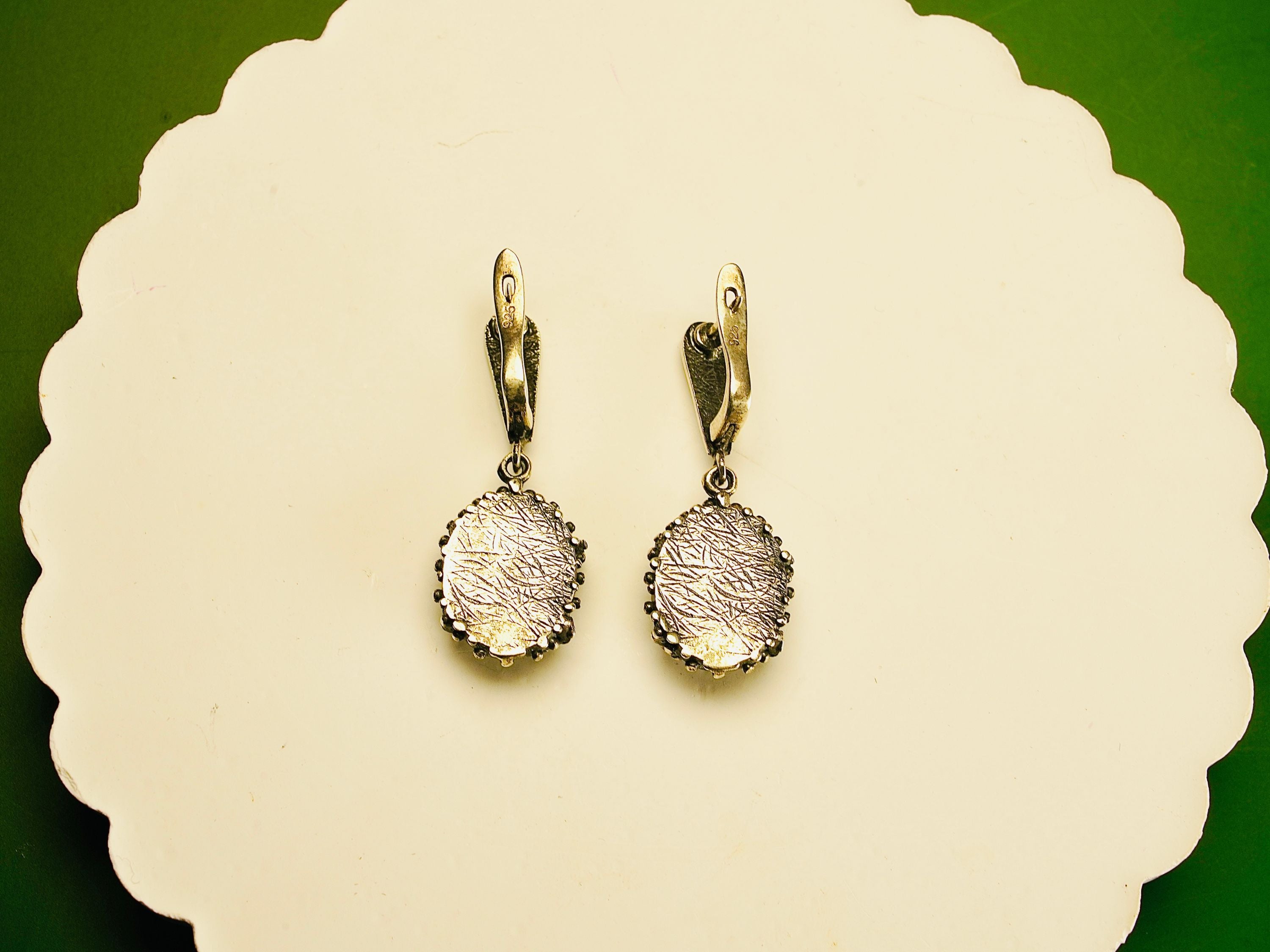 Backside jade earrings rear view leverback closure silver detail