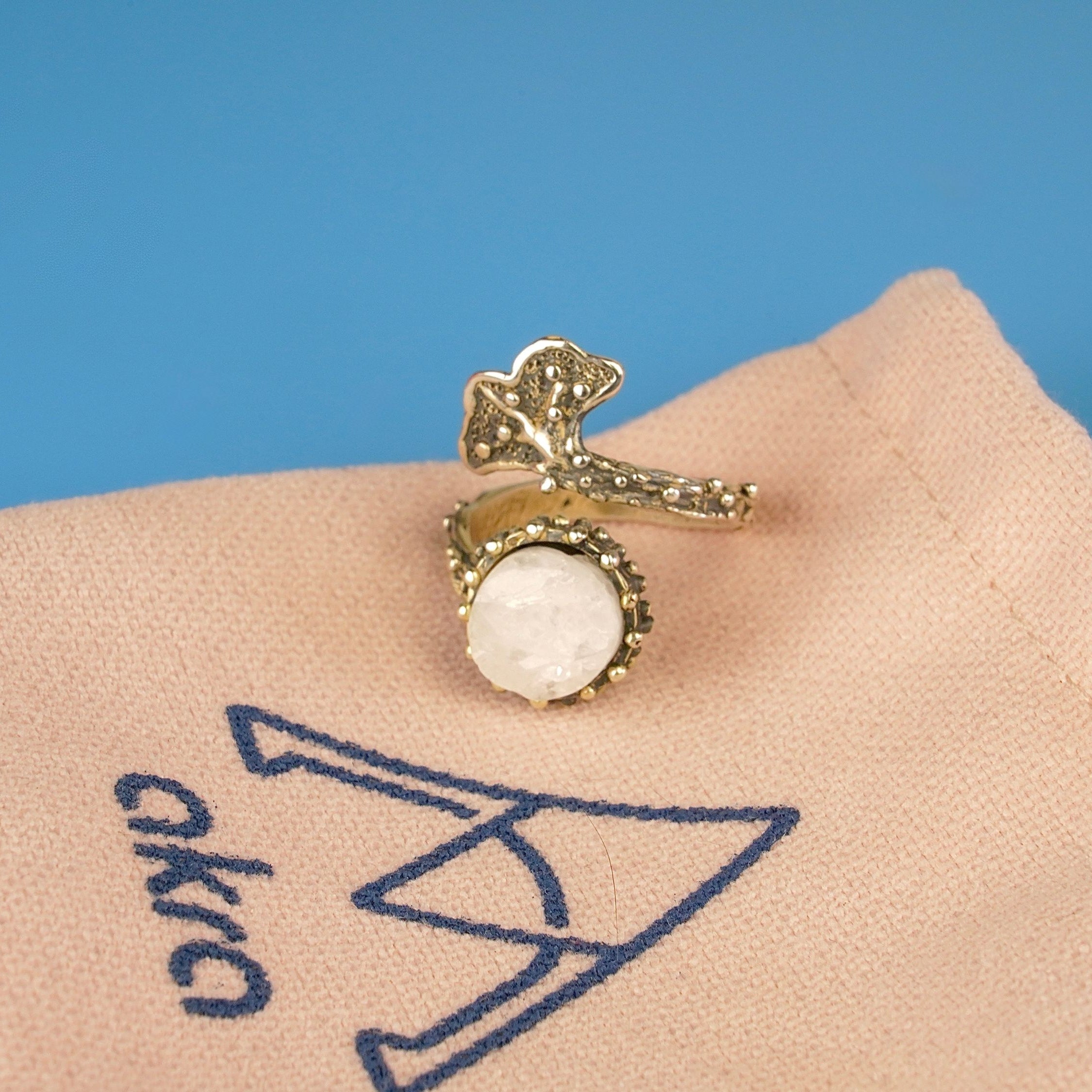 Moonstone adjustable ring craftsmanship silver setting detailed view