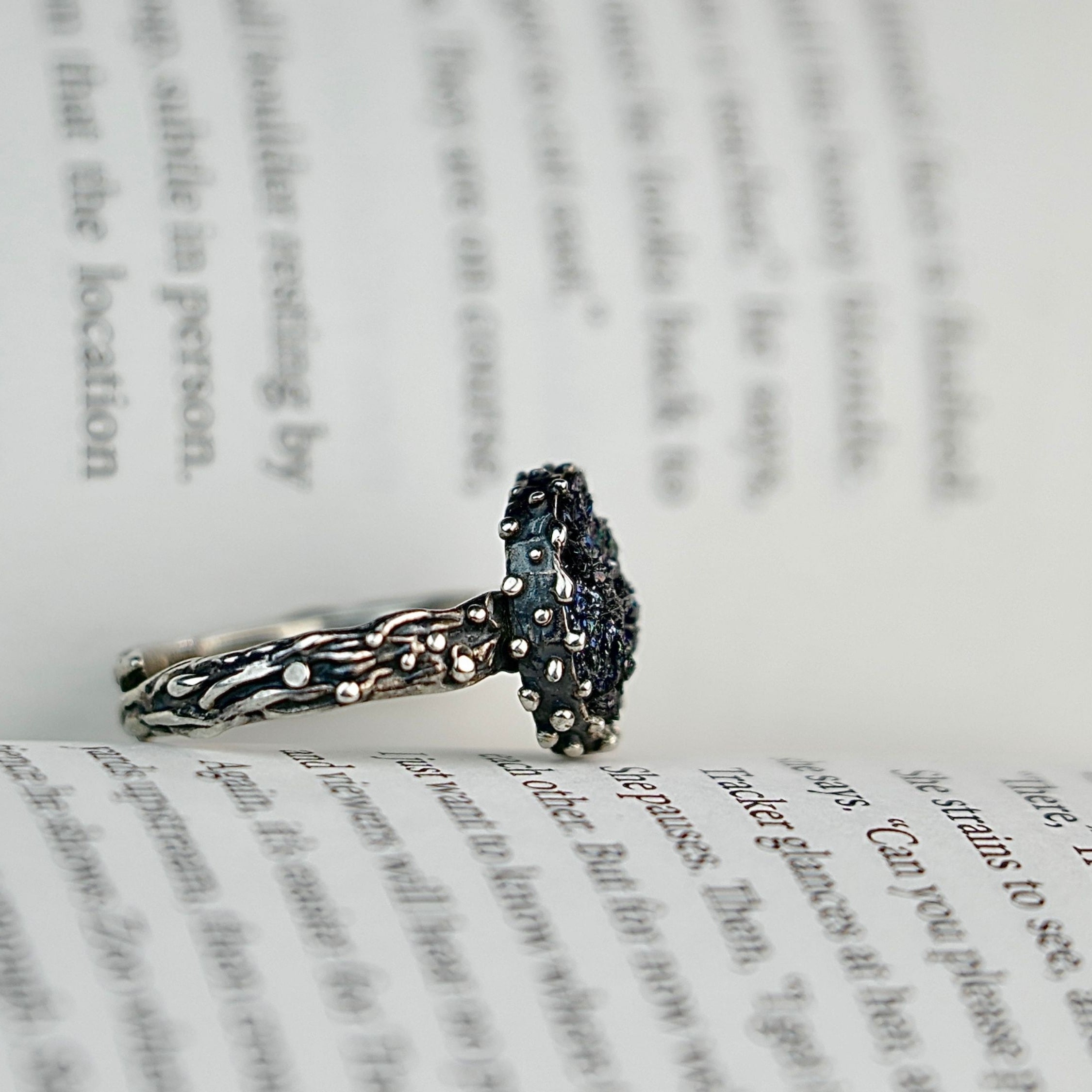 Black tourmaline adjustable ring craftsmanship silver setting detailed view