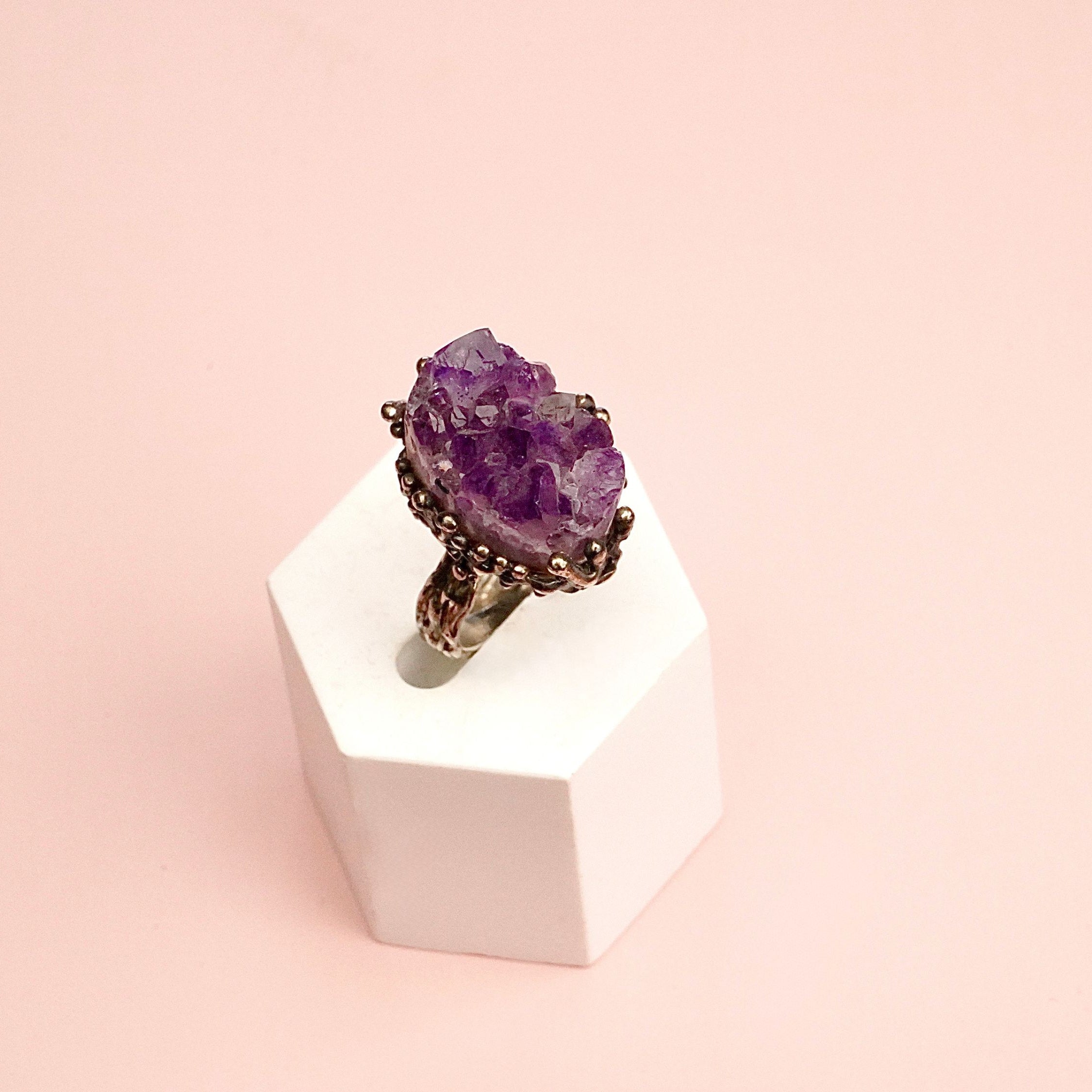 Alternative close up raw amethyst crystal variation purple stone macro detail adjustable ring