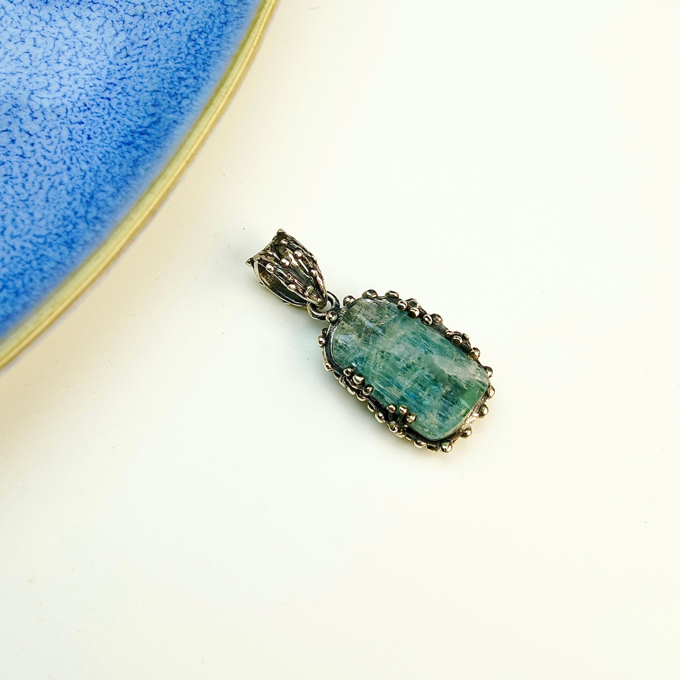 Alternative close up aquamarine crystal variation blue gemstone macro detail pendant