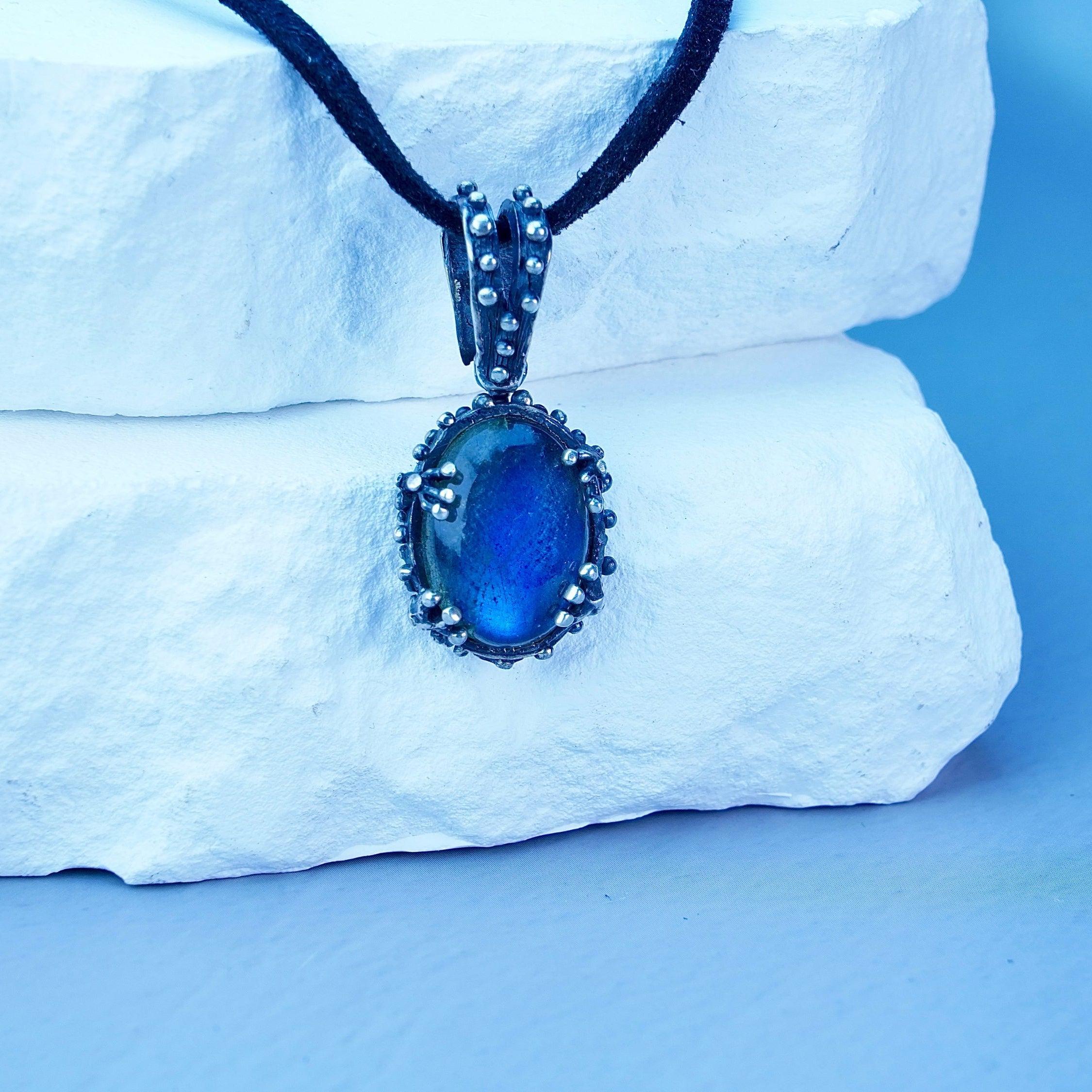 Alternative close up labradorite blue flash gemstone macro detail pendant