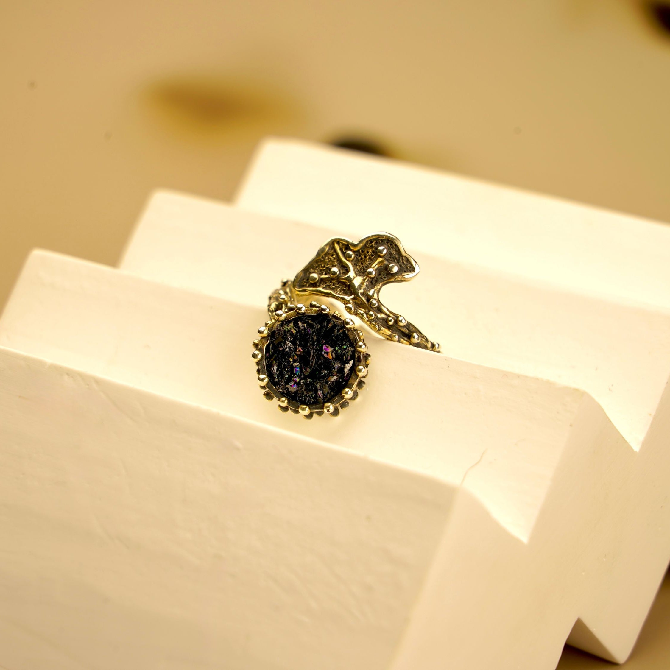 Detailed variation black tourmaline gemstone ring texture alternative angle close up