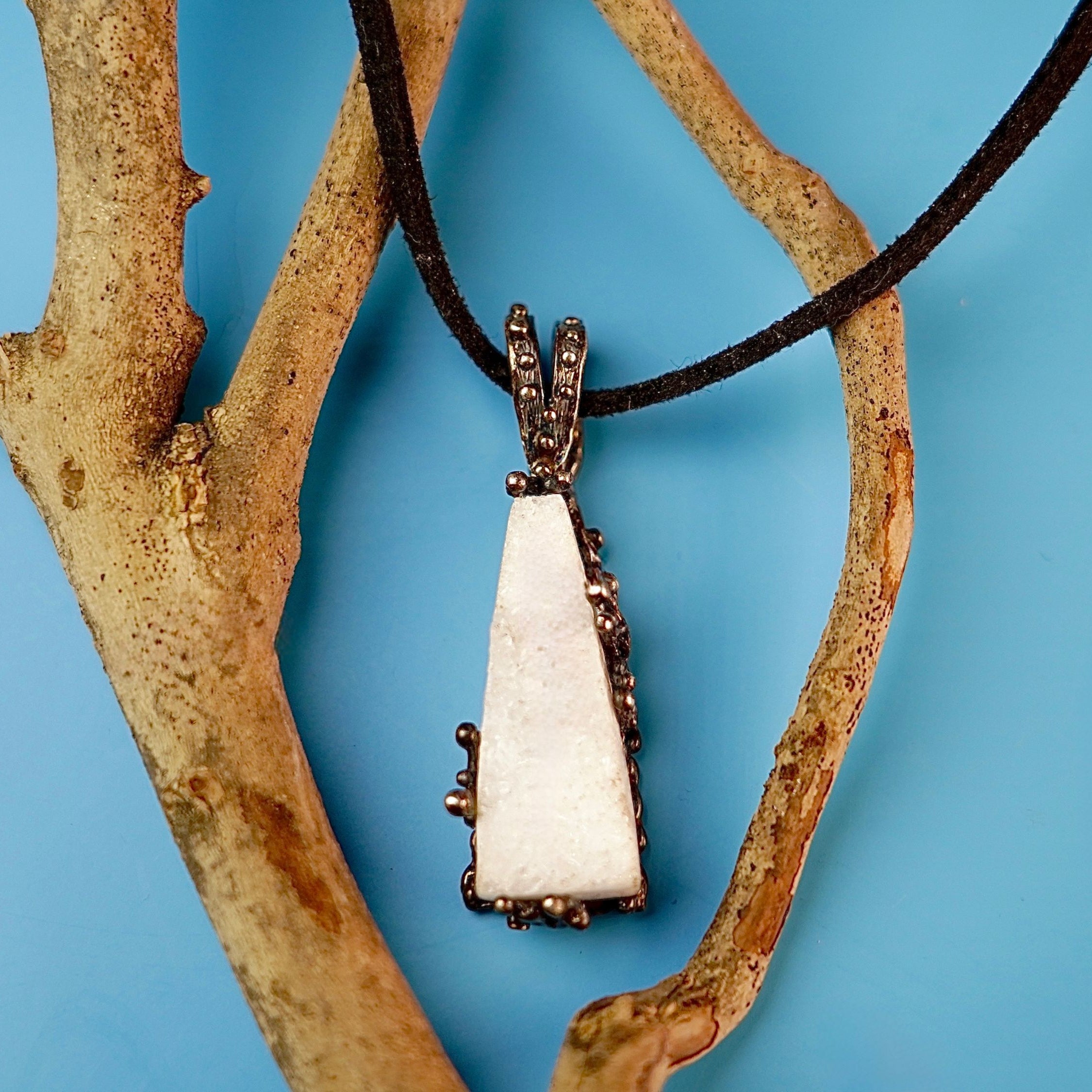 Alternative close up moonstone crystal variation white gemstone macro detail pendant
